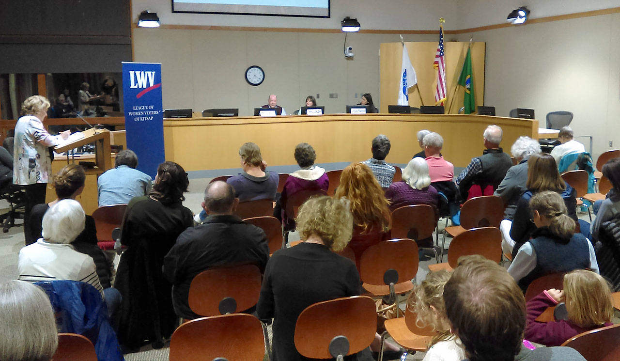 Luciano Marano | Bainbridge Island Review - A crowd gathers to put questions to Bainbridge Island School Board candidates Mike Spence (at left, unopposed, Director District 2), and Sheila Jakubik (center) and Christina Wakefield (right), battling each other for the District 5 position.