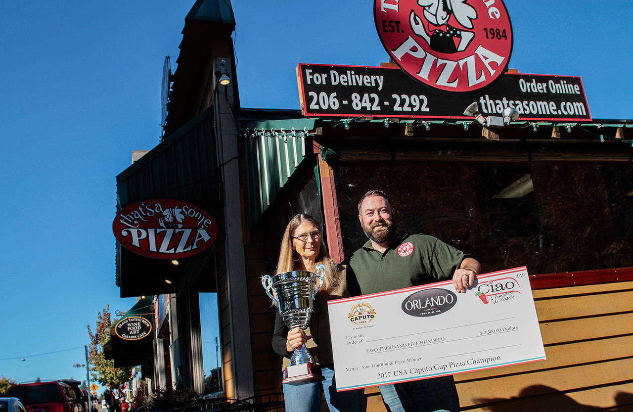 Luciano Marano | Bainbridge Island Review - Will Grant, seen here with mother, Marti, won first place from among more than 40 pizza chefs in the non-traditional category of the recent Caputo Cup pizza competition New Jersey.