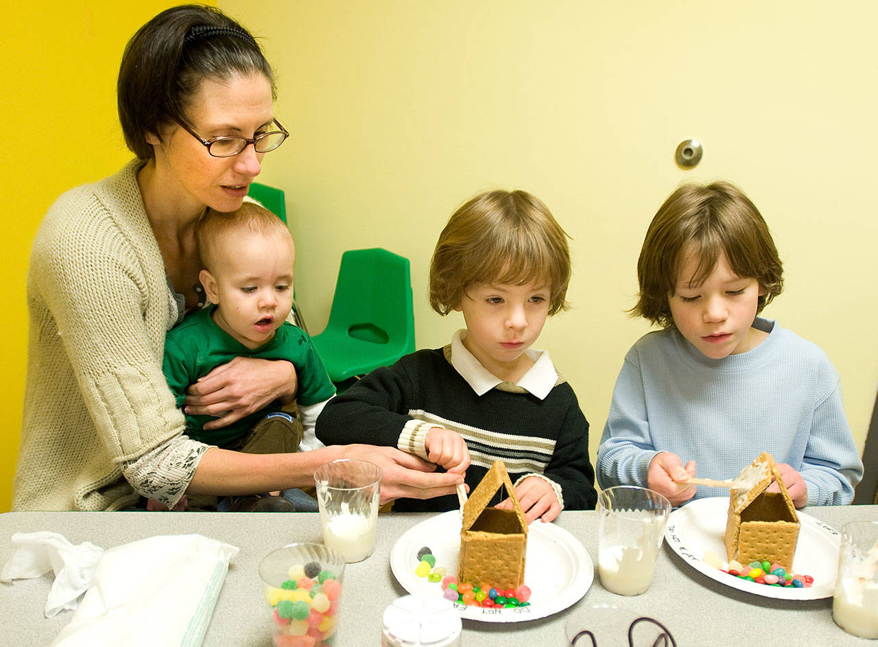 Kids have fun with gingerbread house workshops