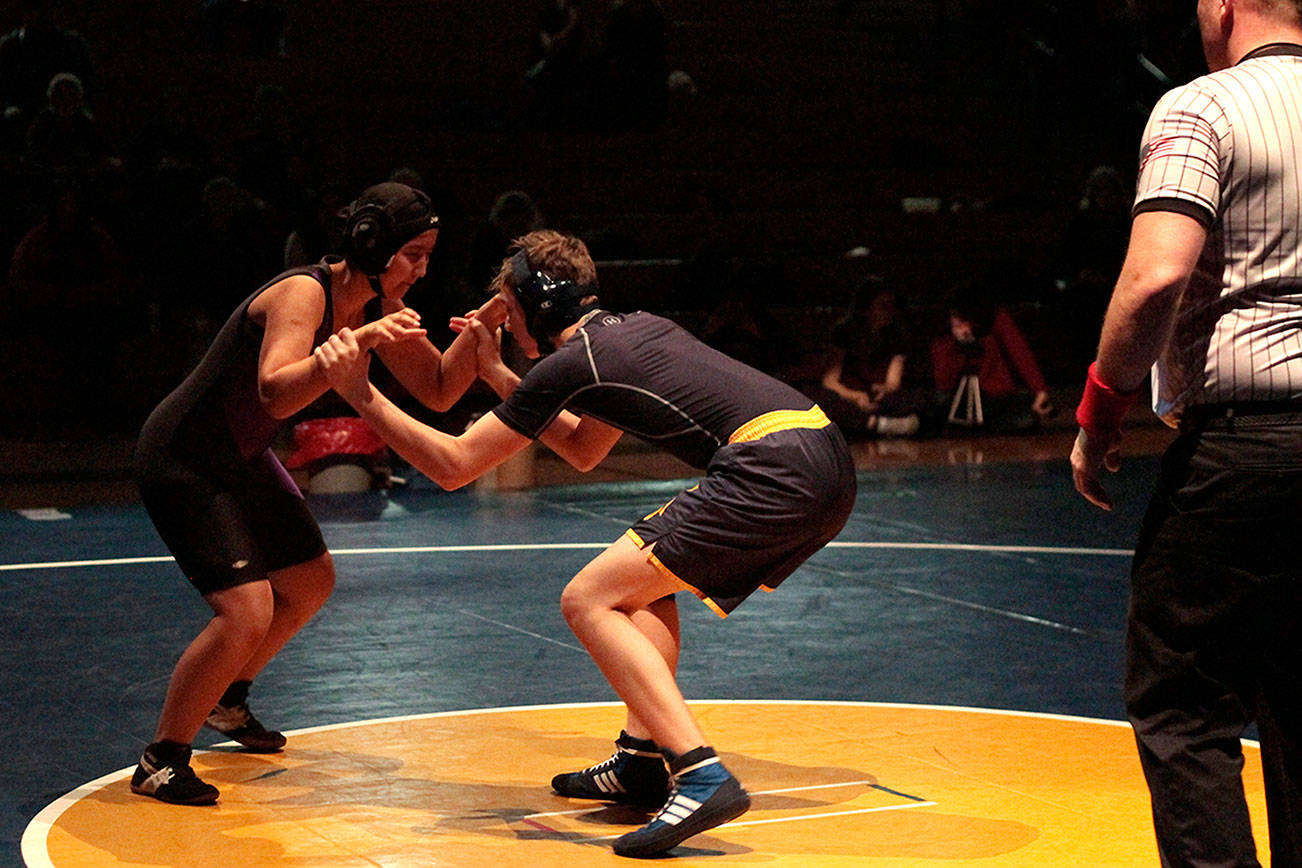Spartans win some, lose some in year’s first home wrestling meet | Photo gallery