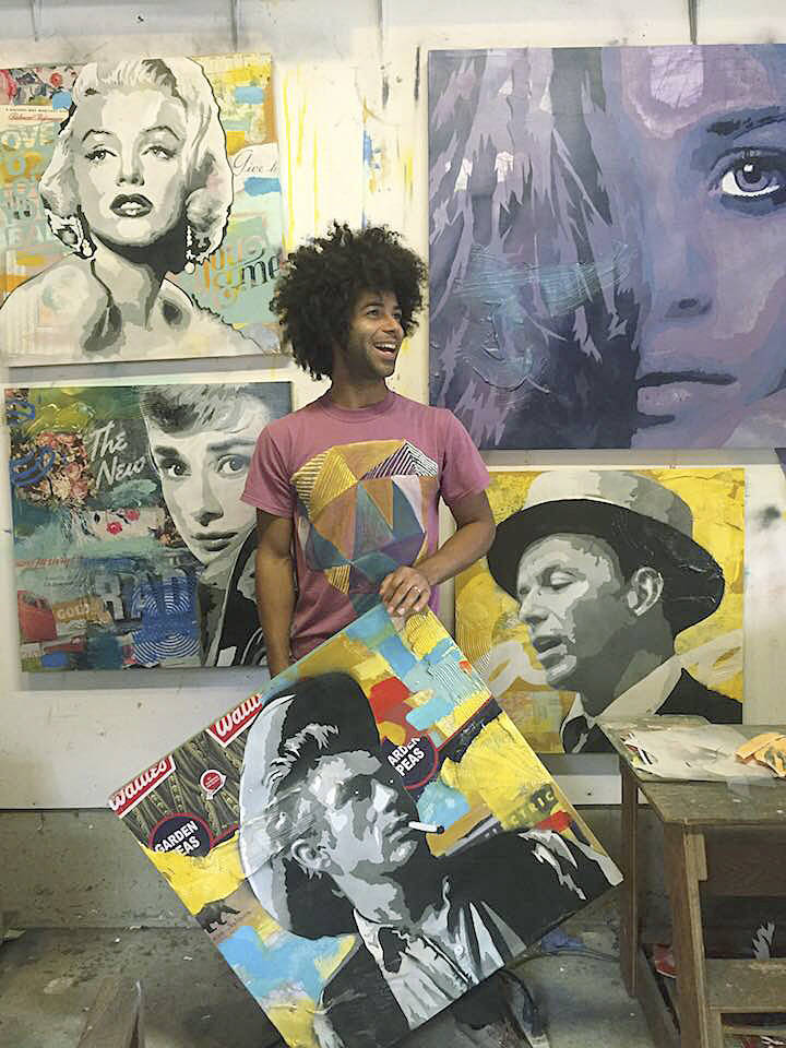 Artist Cory Bennett with some of creative portraits he has done. He’s currently working on murals in Poulsbo. (Photo courtesy of Cory Bennett)