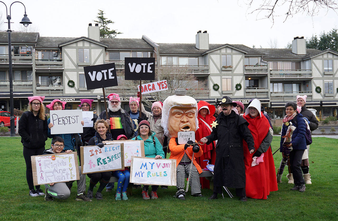 High hopes, busy feet: Bainbridge heads off to the second Women’s March | Photo gallery