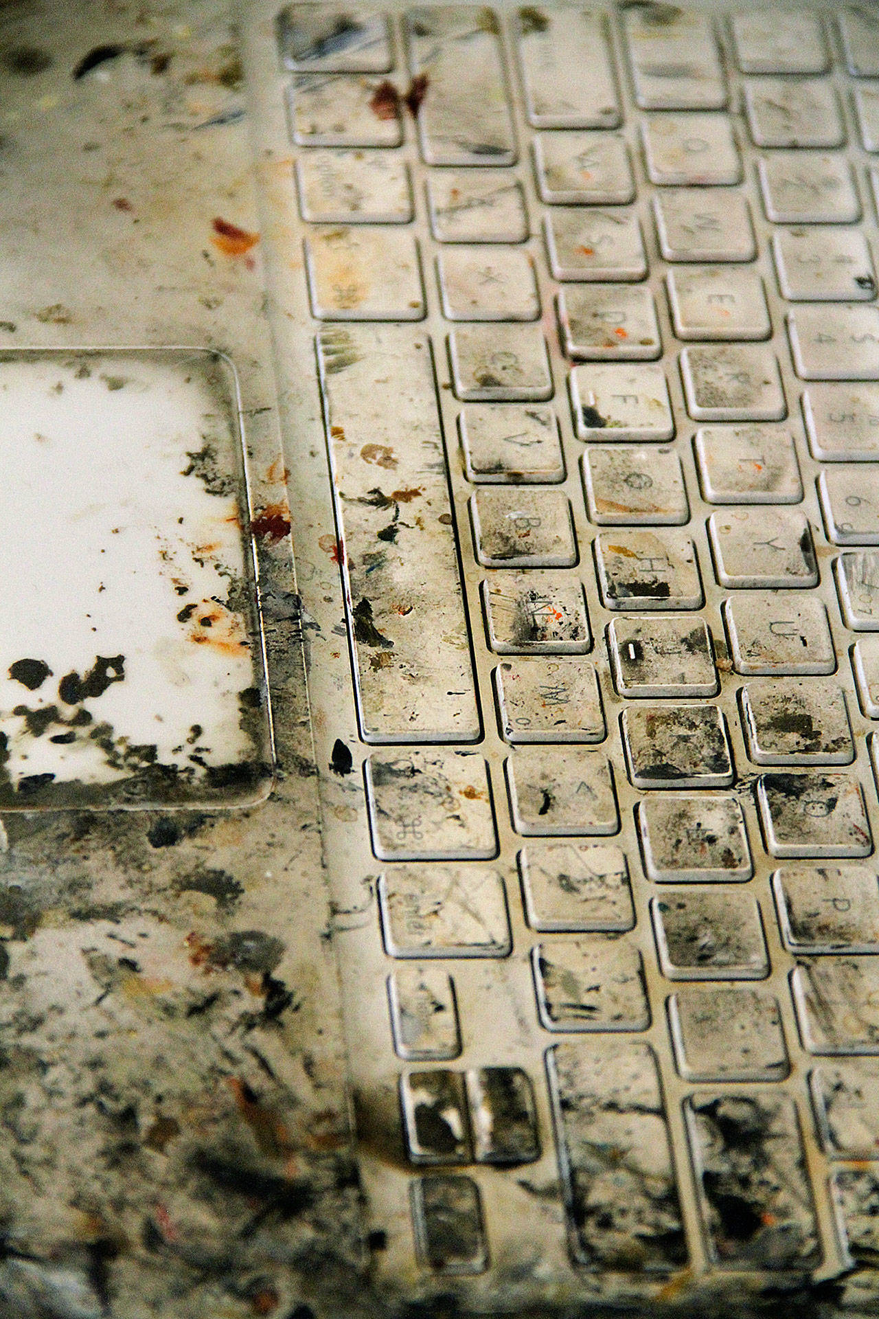 Robert McCauley’s ink- and paint-stained computer keyboard in his show, “American Fiction,” at BIMA. (Brian Kelly | Bainbridge Island Review)