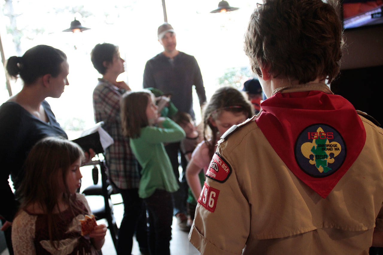 Luciano Marano | Bainbridge Island Review - Bainbridge Island’s Cub Scout Pack 4496 held an informational outreach event at West Side Pizza recently, inviting interested families to come learn more about Scouting, and also to announce their new coed status.