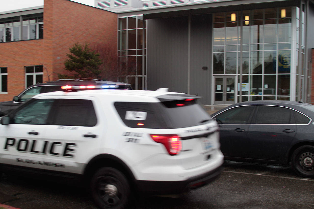 School lockdown leads to frantic manhunt | Photo gallery