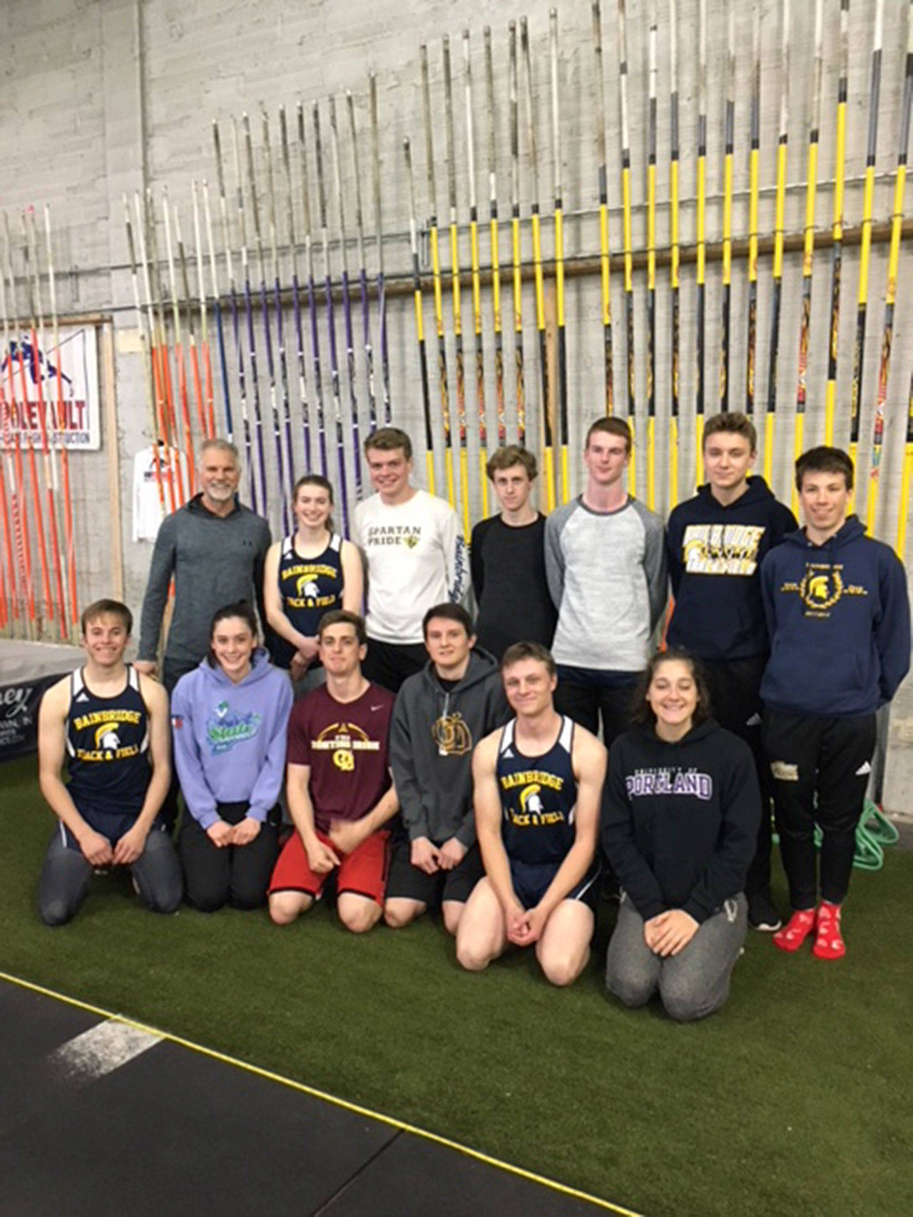 Photo courtesy of John Bierly | Bainbridge High School track and field team pole vault coach John Bierly, top left, stands with the pole vault squad, several of whom lead in the Metro standings and are predicted to have strong showings at State.