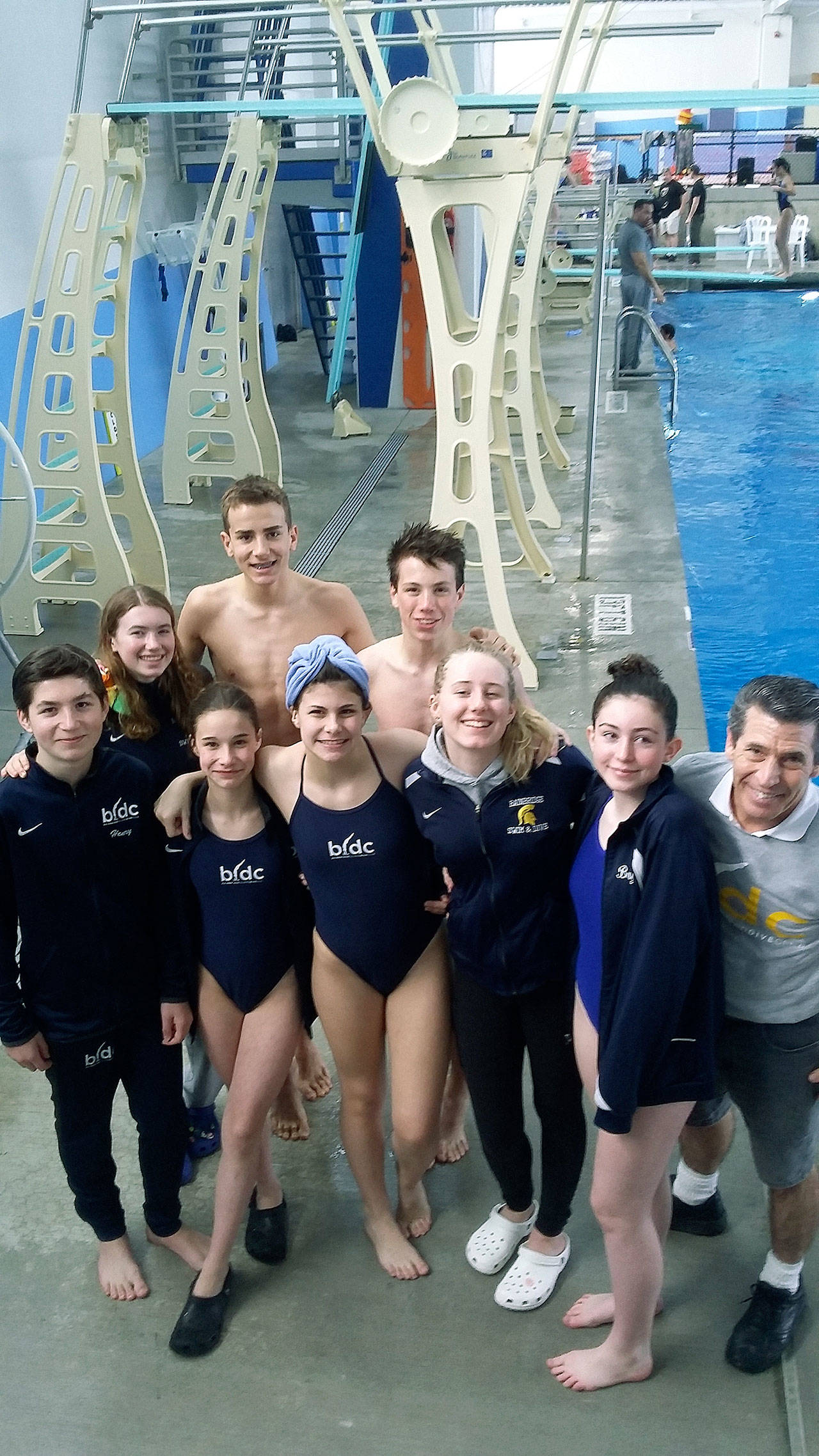 Members of the Bainbridge Island Dive Club gather for a group photo at their last meet of the regular season in Beaverton, Oregon. (Photo courtesy of Adrienne Wolfe)