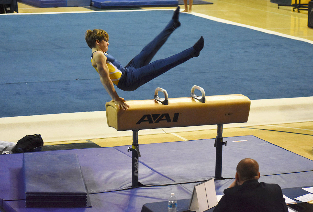 Jacob Hall competes on pommel during the Region 2 meet. (Markos Scheer photo)
