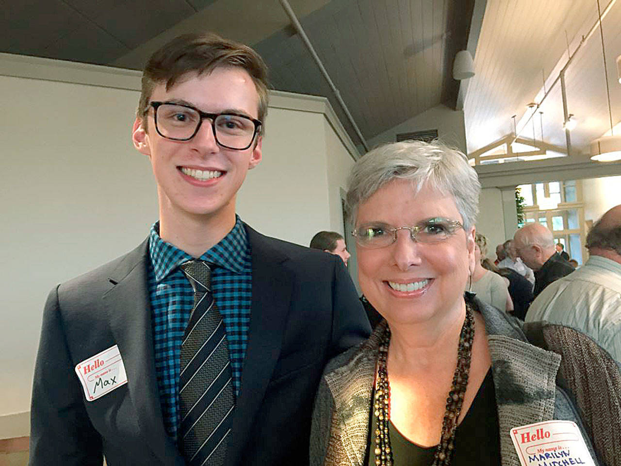 Max Weber, the Jay Mitchell Memorial Scholar, stands with Marilyn Mitchell.                                (Photo courtesy of the Rotary Club of Bainbridge Island)