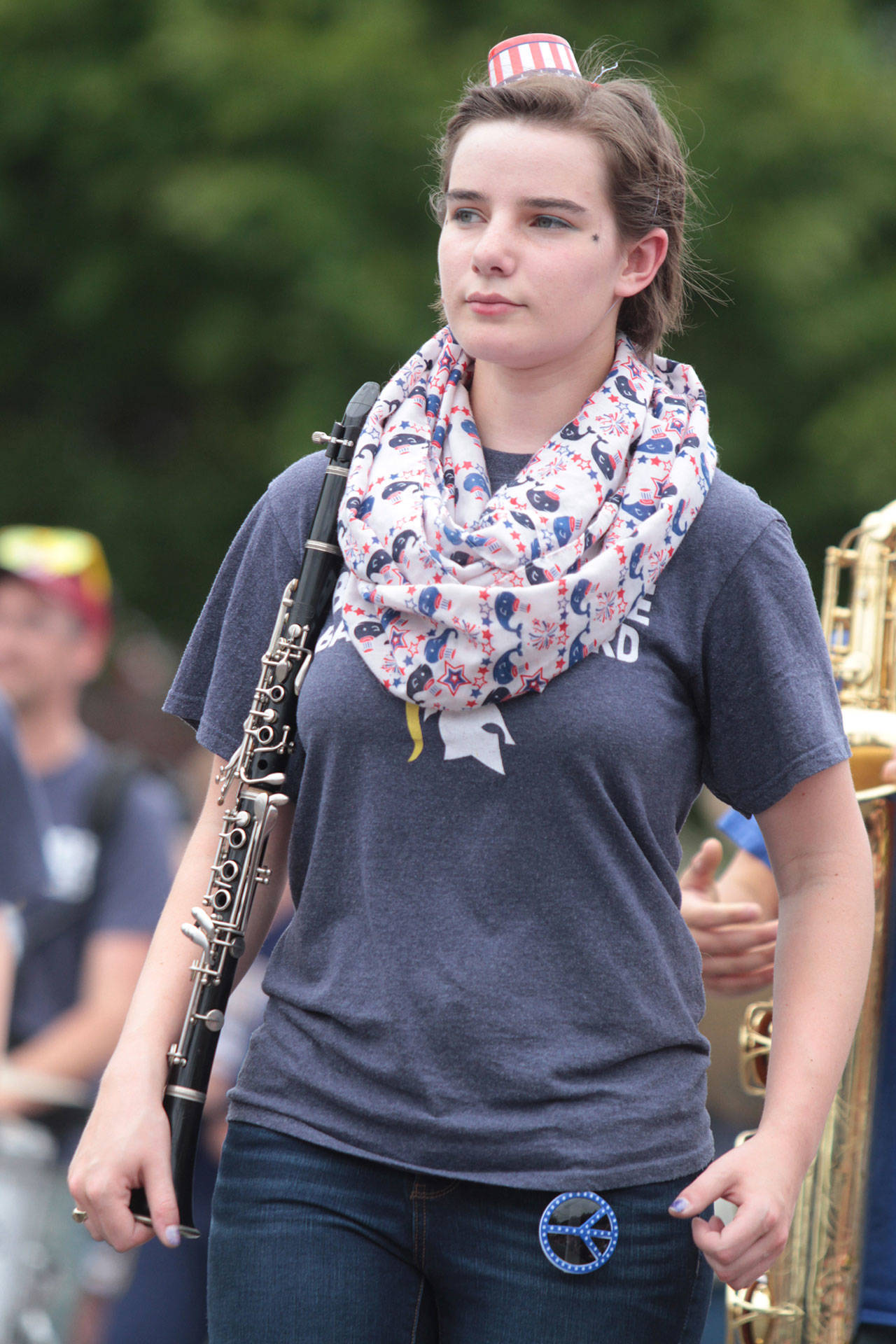 A member of the Bainbridge High School Marching Band marches in this year’s Fourth of July parade. (Brian Kelly | Bainbridge Island Review)