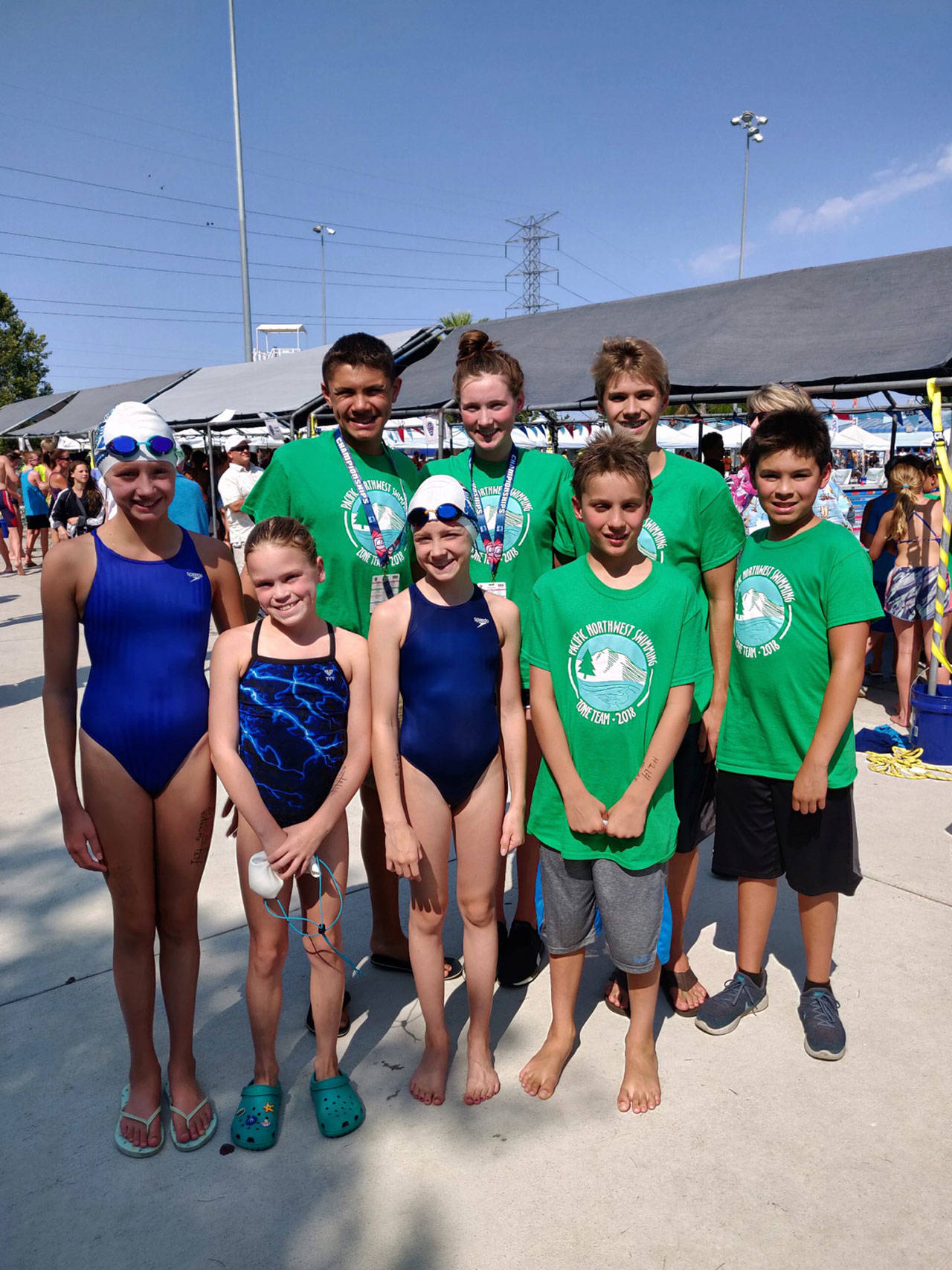 Members of the Bainbridge Island Swim Club gather for a photo at the Western Zone Swimming Championships.