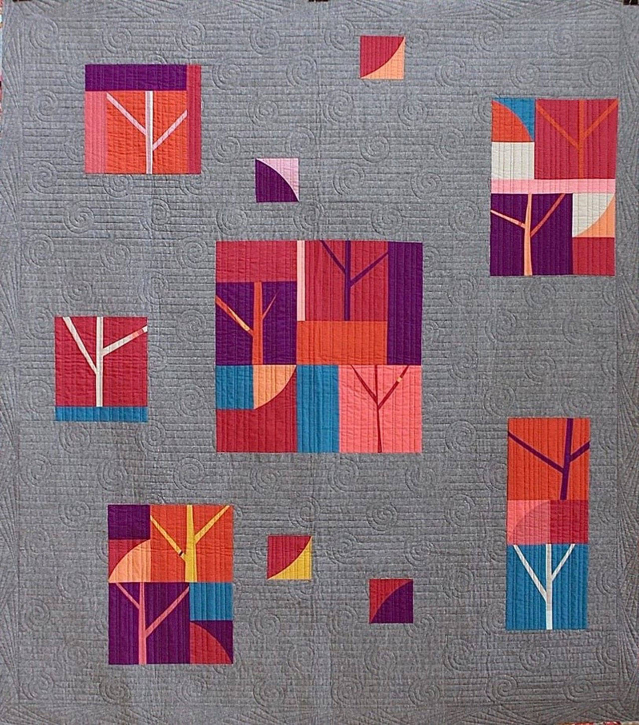 Image courtesy of the Bainbridge Island Modern Quilt Guild | “Northwest Sunset,” by Susan Smith, is the grand prize up for grabs in the raffle at this year’s Bainbridge Quilt Festival, returning to downtown Winslow Saturday, Sept. 8.