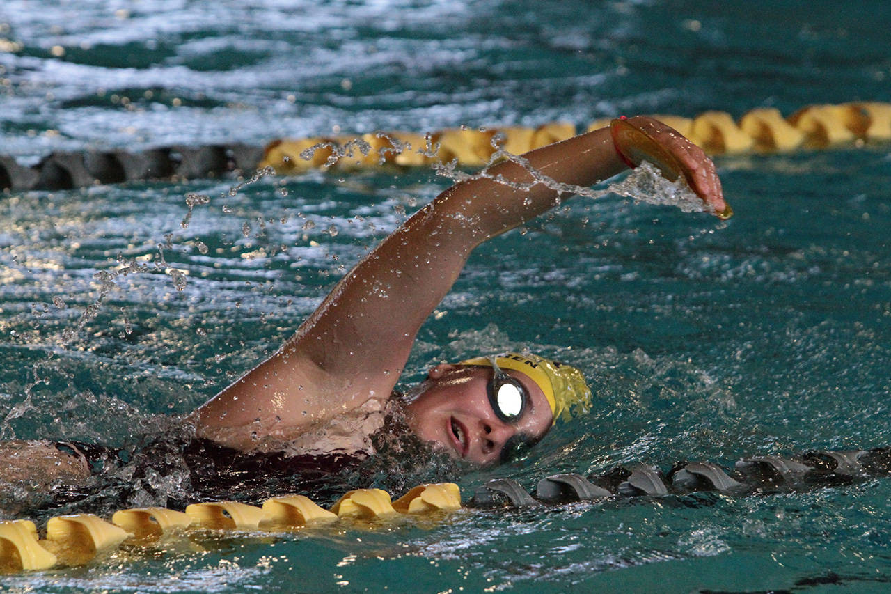 Julia Nordgren practices Tuesday with her fellow Spartan swimmers at the Bainbridge Aquatic Center. (Brian Kelly | Bainbridge Island Review)