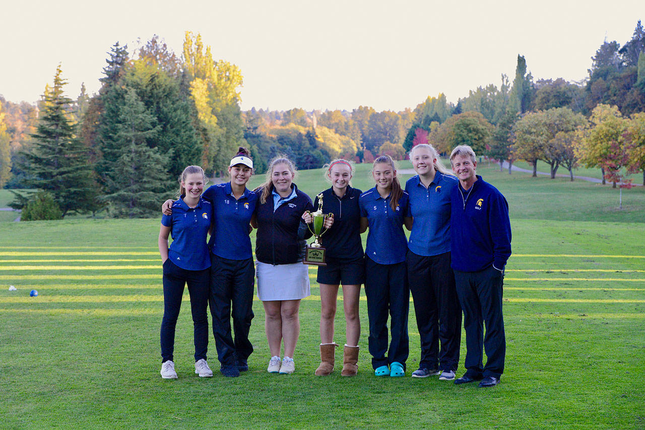 Photo courtesy of Ian Havill | The Bainbridge High School girls varsity golf team pose for a photo after winning the Metro title, their second in three years.
