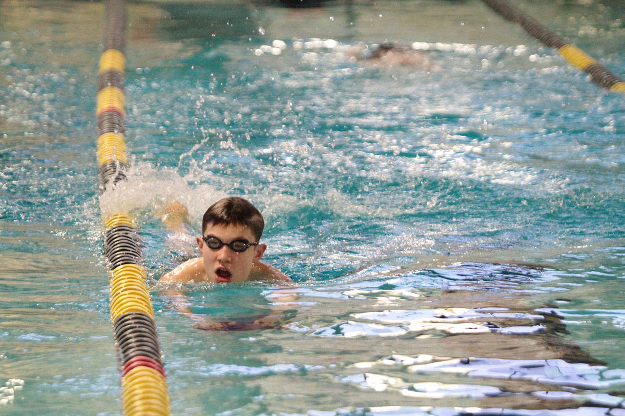 Peter Bang-Knudsen swims laps during a practice session at the Bainbridge Aquatic Center. (Brian Kelly | Bainbridge Island Review)