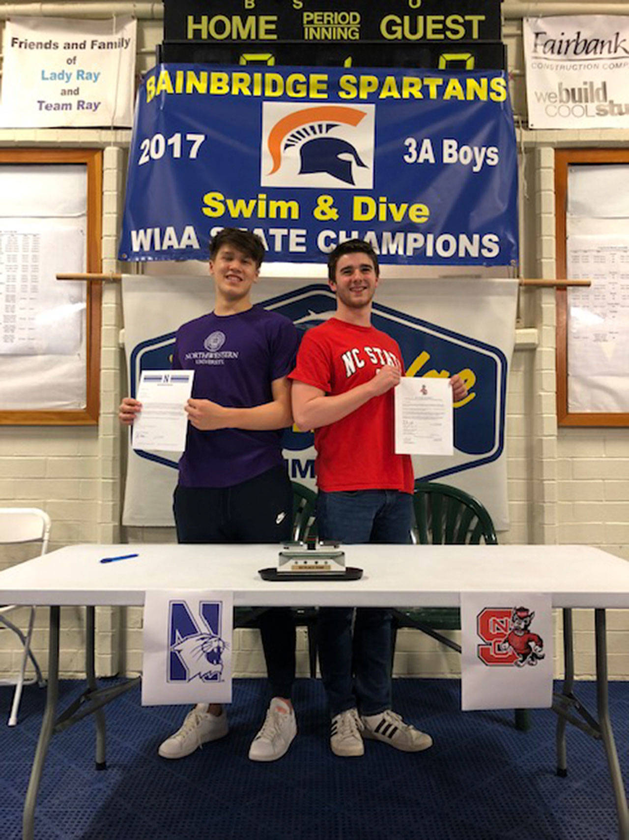 Two Spartan swimmers sign letters of intent