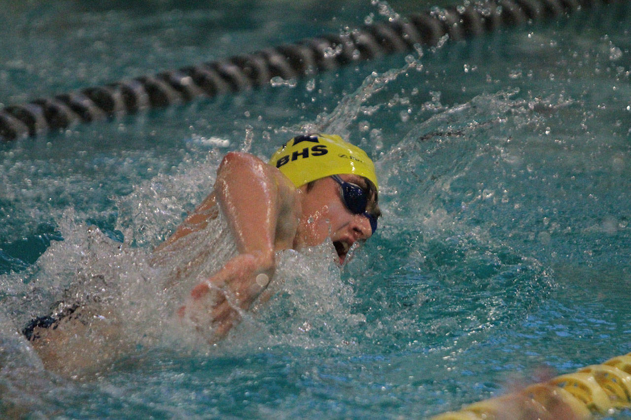 Spartan swimmer Carter Hall competes in the 200-yard freestyle during the meet against O’Dea. (Brian Kelly | Bainbridge Island Review)