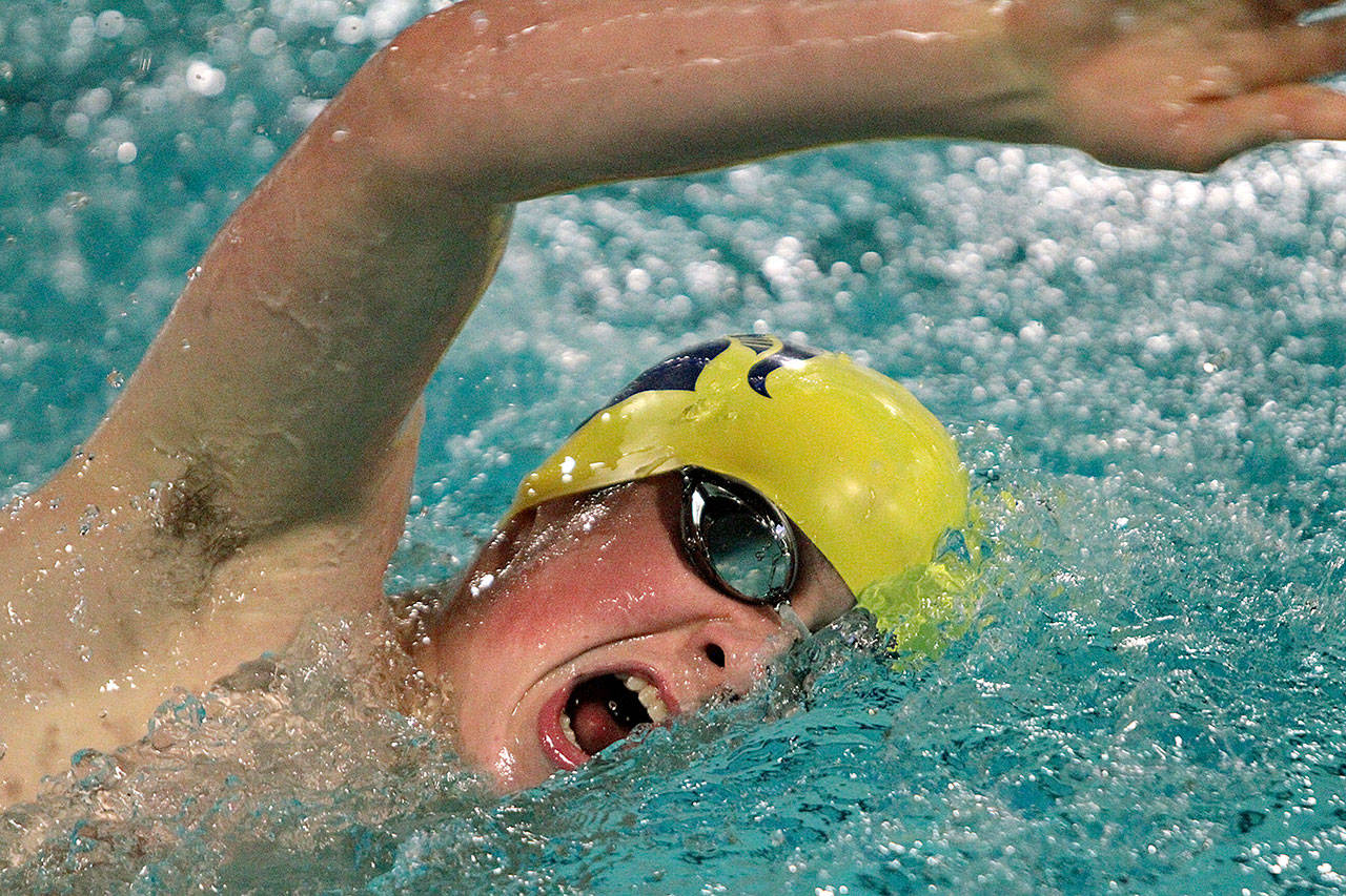 Luke Shields competes in the 200-yard freestyle for the Spartans in Bainbridge’s big win over the Braves. (Brian Kelly | Bainbridge Island Review)