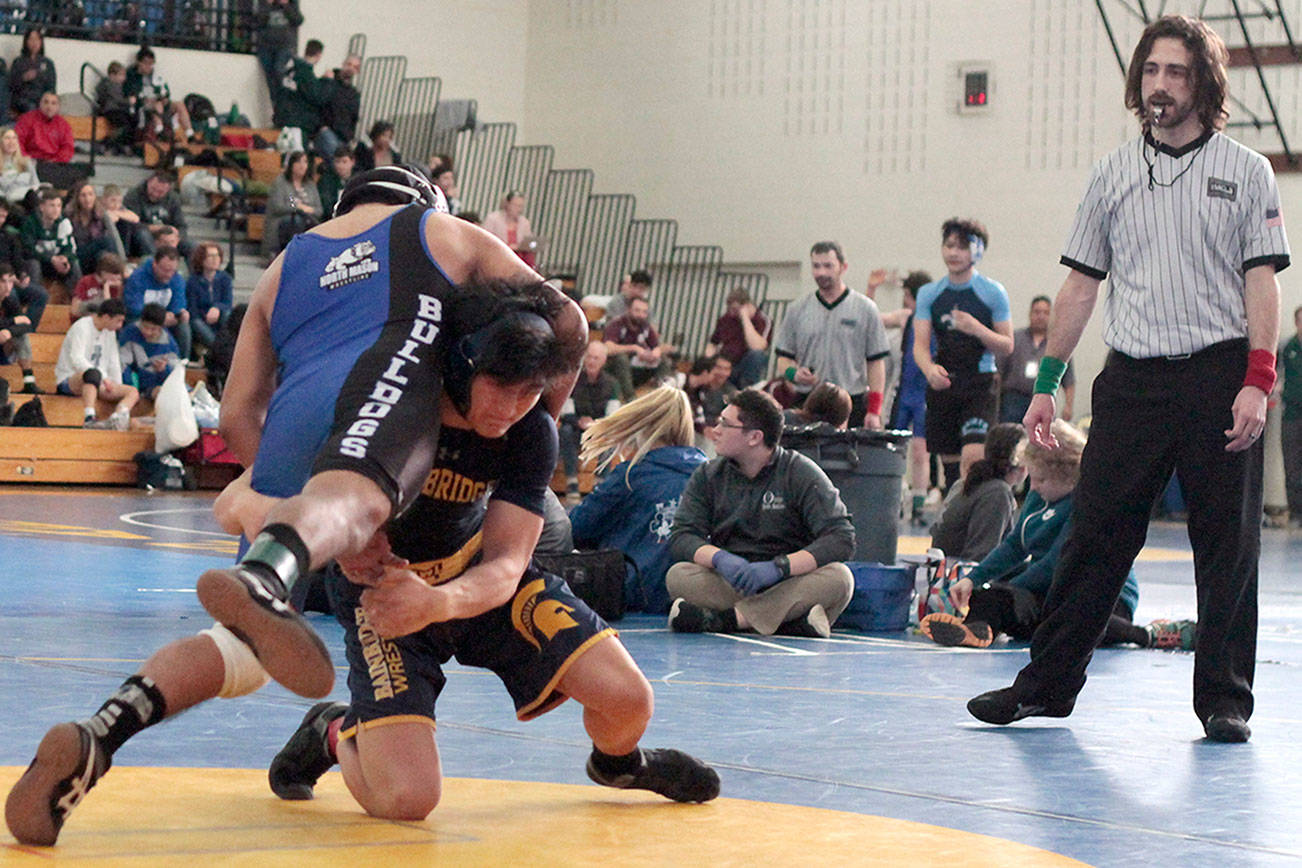Mat moments: Spartans host home turf wrestling tourney | Photo gallery
