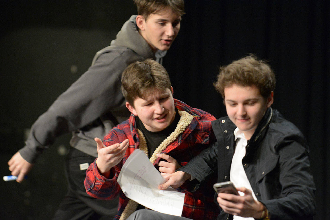 Jon Anderson photo | Bainbridge High School junior Chris Daniels (left) and seniors Ethan Neeleman (center) and David Baker rehearse “Miscommunication,” one of nine original productions presented in this year’s Winter One Acts.