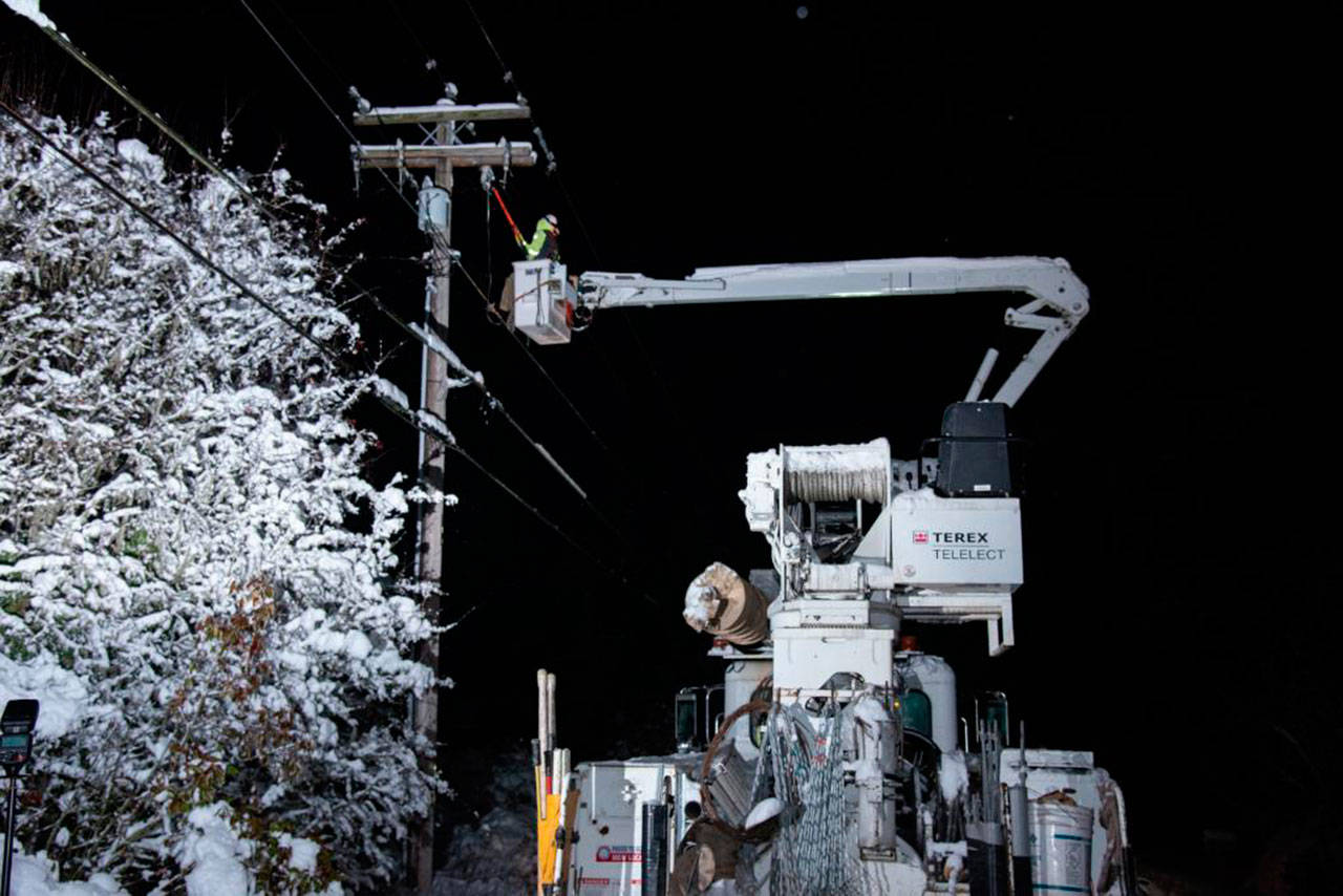 Puget Sound Energy said crews have been working through the night to restore electricity since first snowstorms hit the area Friday. (Photo courtesy of PSE)