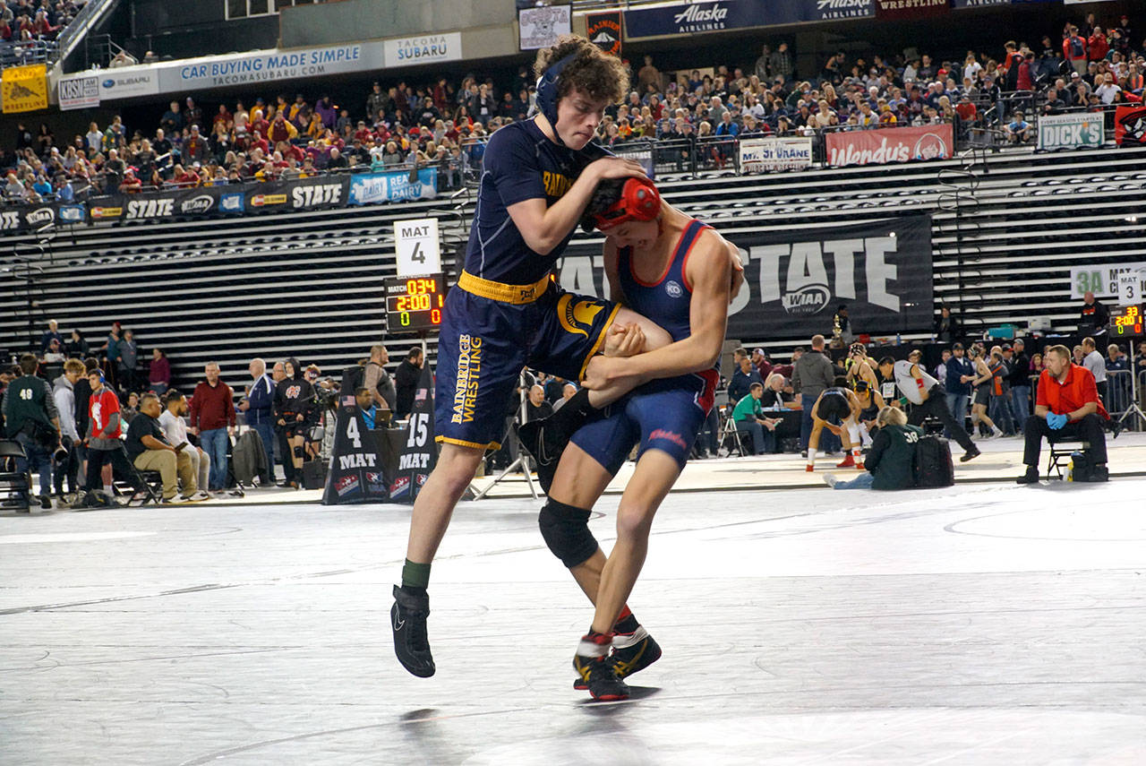 Luciano Marano | Bainbridge Island Review - Bainbridge’ sole 126-pounder Indigo Weappa claimed a 3-0 decision against Nathan Hale’s Emmett Donnelly in his first bout at the WIAA’s Mat Classic XXXI Friday, Feb. 22.