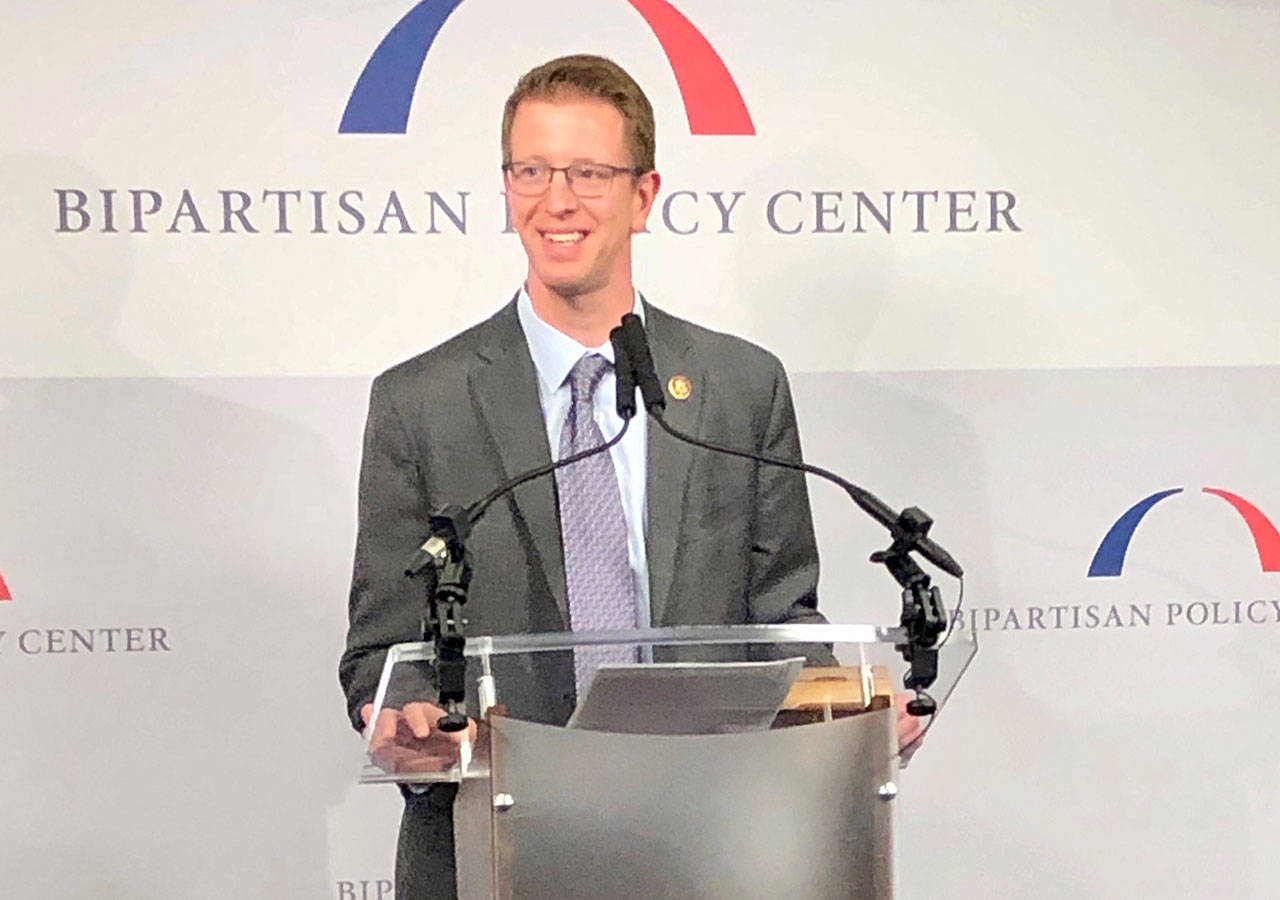 Rep. Derek Kilmer gives an acceptance speech after receiving the Legislative Action Award from the Bipartisan Policy Center this month. (Bipartisan Policy Center photo)