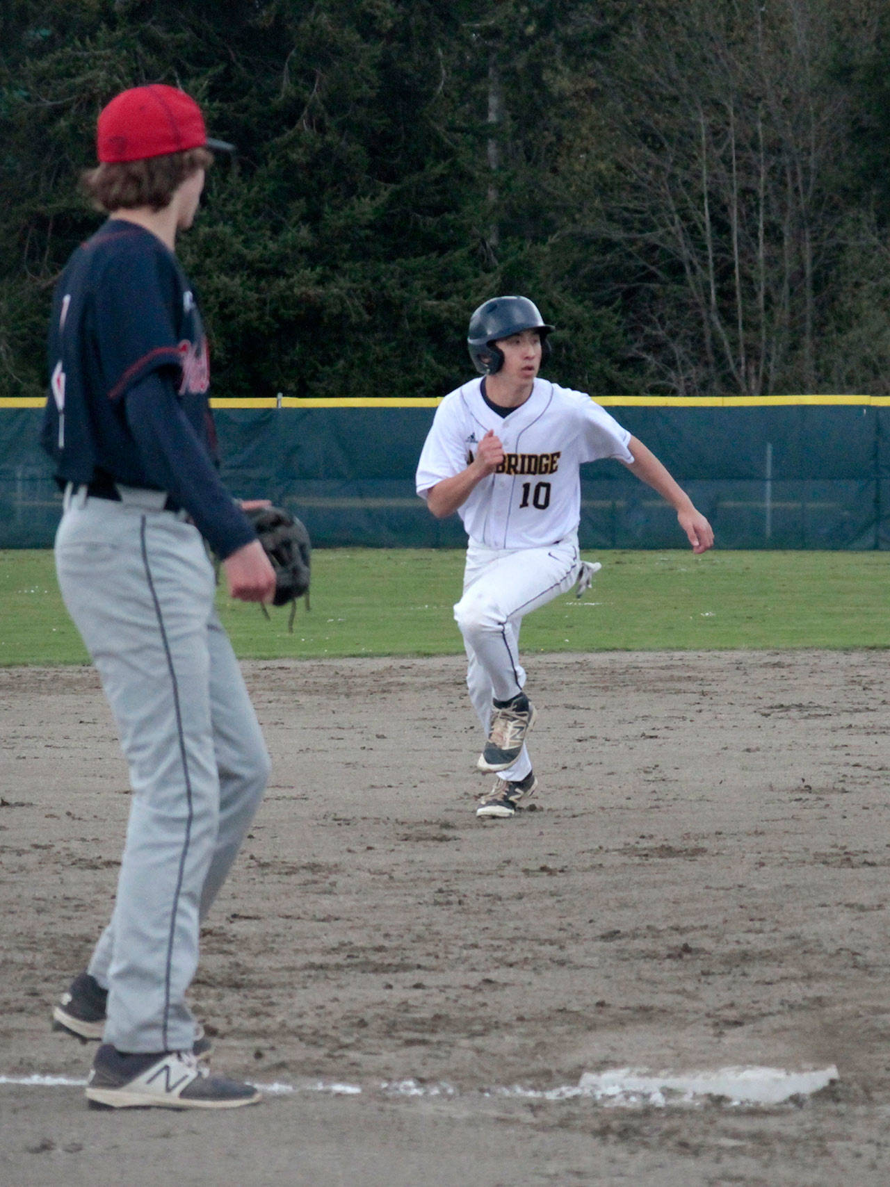 The Bainbridge High varsity baseball team scored a decisive victory against Nathan Hale last week, rebounding from a disappointing loss to Lakeside days before. (Luciano Marano | Bainbridge Island Review)