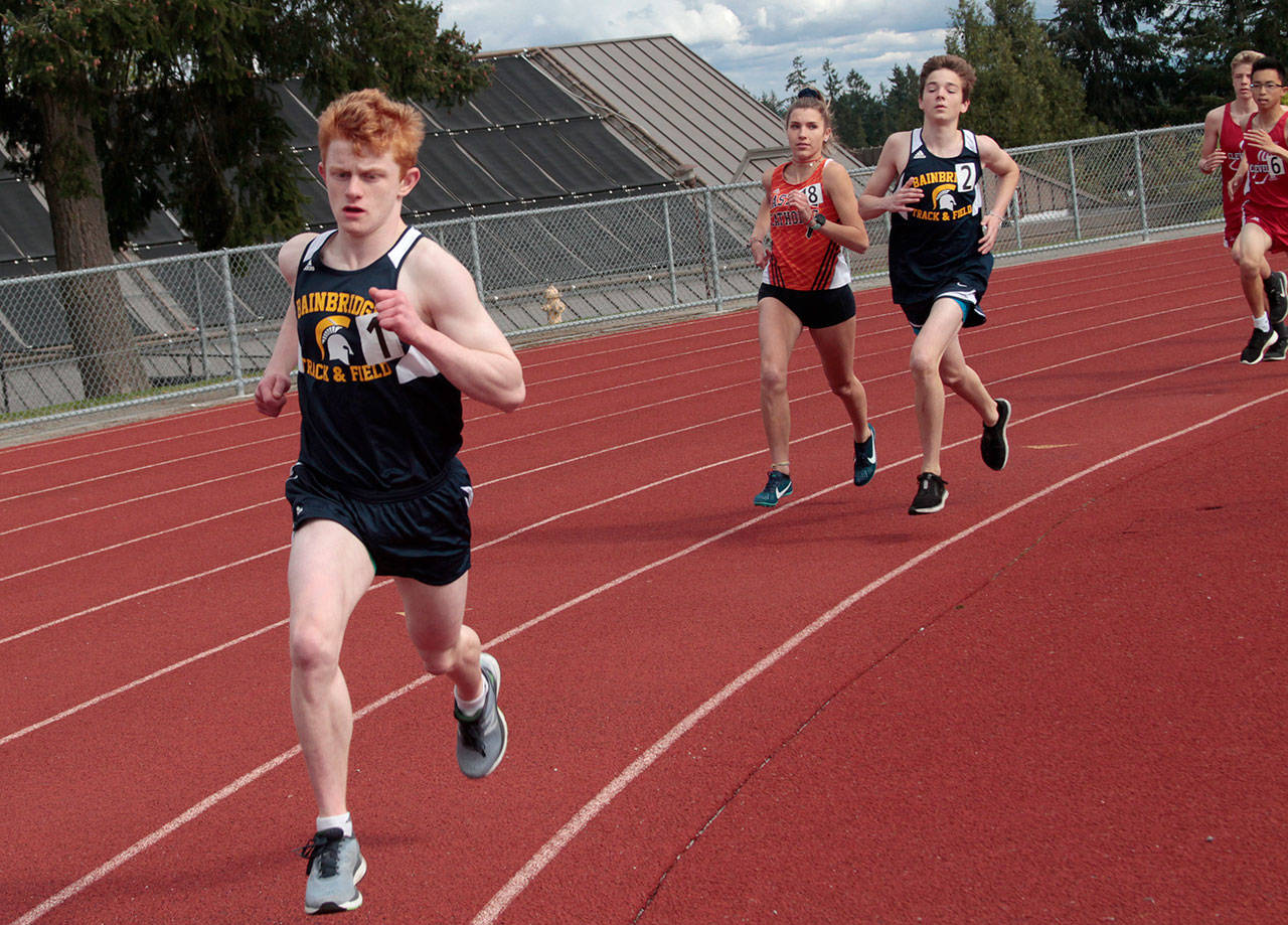 Luciano Marano | Bainbridge Island Review - Bainbridge Island speed machine Alexander Miller notched a new personal record in the 1600-meter event during the three-school home turf meet on Wednesday, April 17.