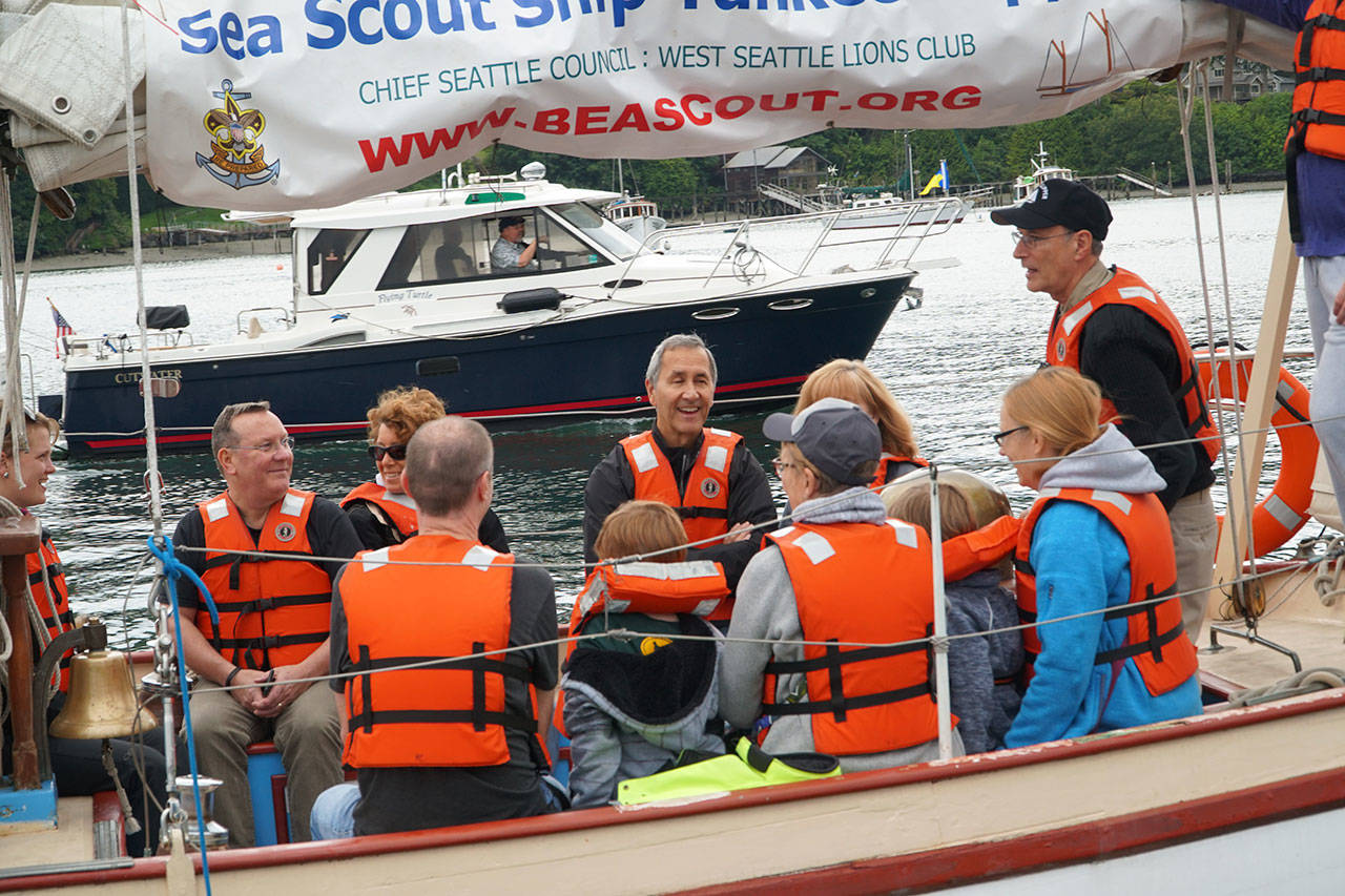 Luciano Marano | Bainbridge Island Review - Boater’s Fair attendees take a ride aboard the Sea Scout Ship Yankee Clipper, a 44-foot sail-training vessel which provides a “hands-on” maritime program for youth during last year’s event.