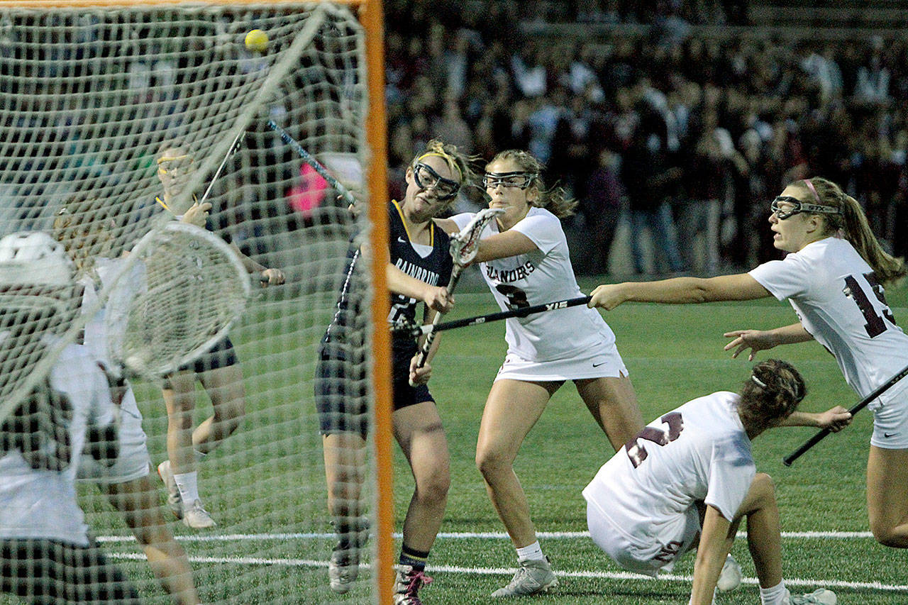 Kendall Havill fires in her fifth goal of the night to tie up the state title game at 9-9. (Brian Kelly | Bainbridge Island Review)