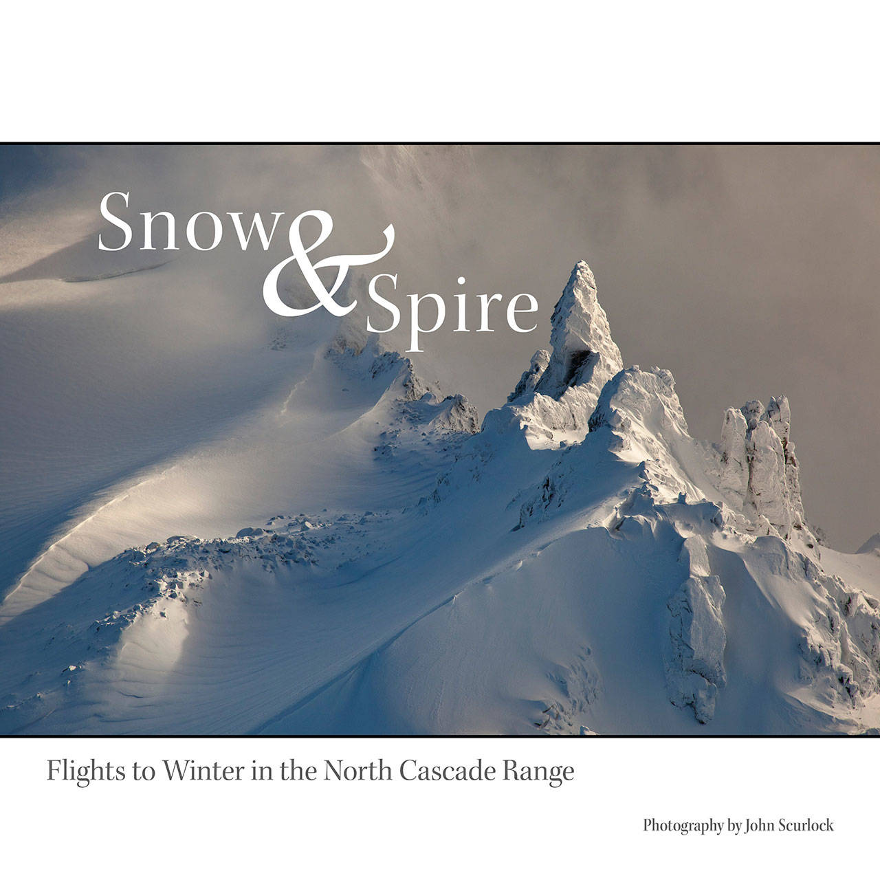 Image courtesy of Eagle Harbor Book Company | Eagle Harbor Book Company will host aerial photographer and pilot John Scurlock to discuss his book “Snow and Spire: Flights to Winter in the North Cascades” at 7:30 p.m. Thursday, July 25.