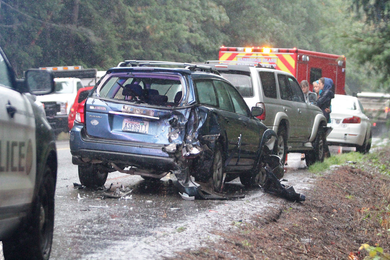 One of the vehicles involved in a multi-vehicle crash Tuesday morning sustained heavy rear-end damage. (Brian Kelly | Bainbridge Island Review)