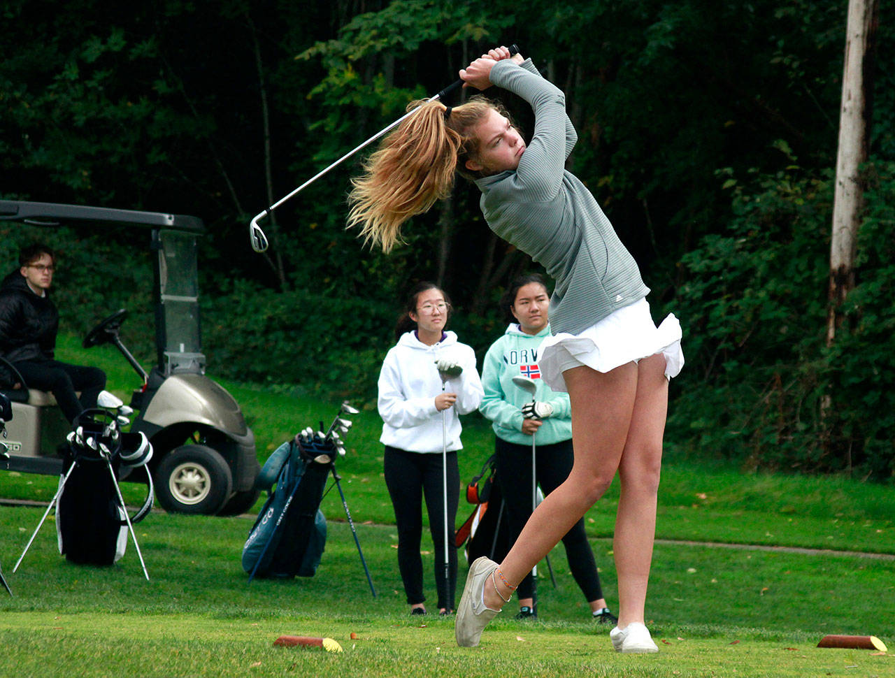 Luciano Marano | Bainbridge Island Review - Margaret Reibsamen tees off during Mondays home match against Garfield.                                 Luciano Marano | Bainbridge Island Review - Margaret Reibsamen tees off during Mondays home match against Garfield.                                 Luciano Marano | Bainbridge Island Review - Margaret Reibsamen tees off during Mondays home match against Garfield.