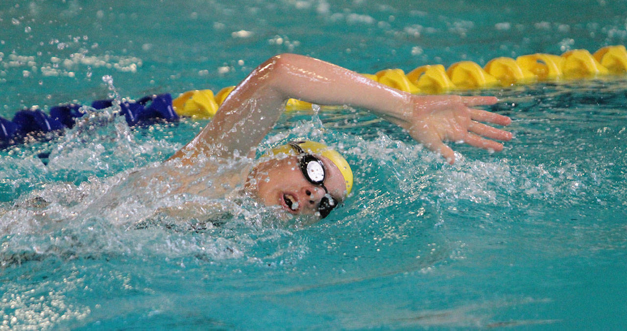 Zeya Korytko swims in the 200-yard freestyle for the Spartans against Bishop Blanchet. (Brian Kelly | Bainbridge Island Review)