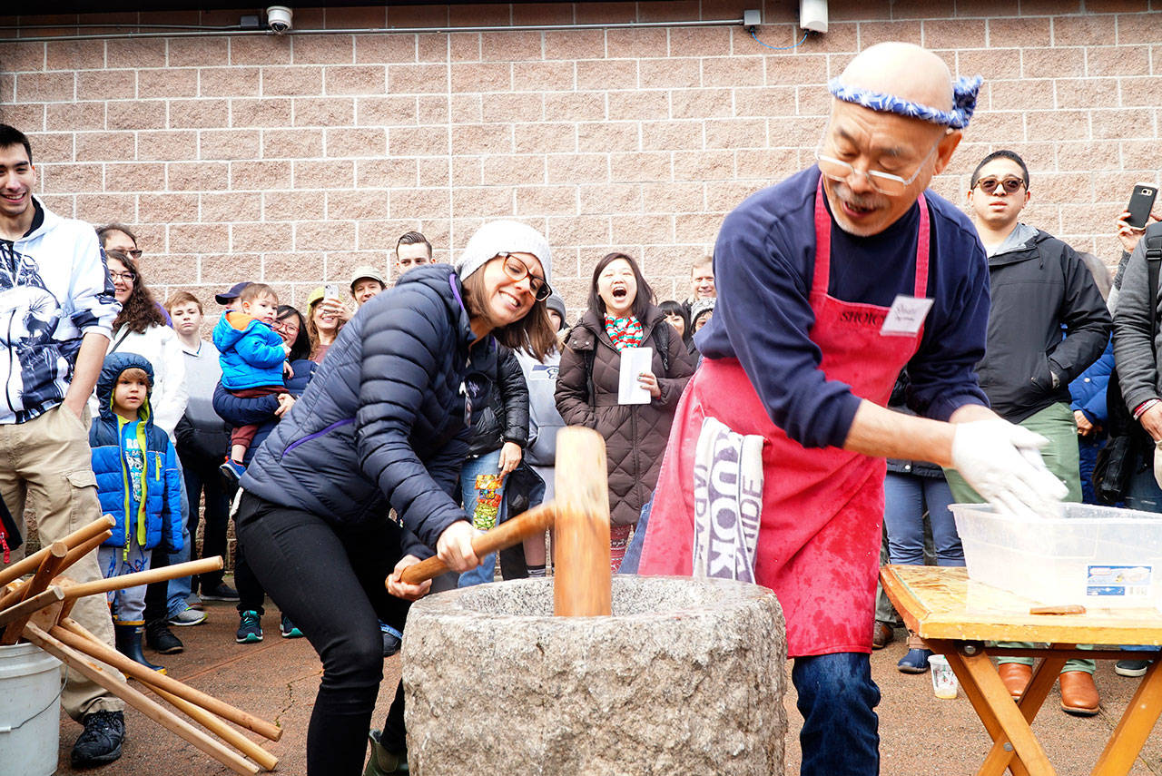 Luciano Marano | Bainbridge Island Review - Longtime head mochi flipper and unofficial face of the island’s annual mochi tsuki event, reportedly the largest of its kind in the country, will “pass the mallet” and retire Saturday, Jan. 4 at this year’s gathering, to be held once again at Woodward Middle School.