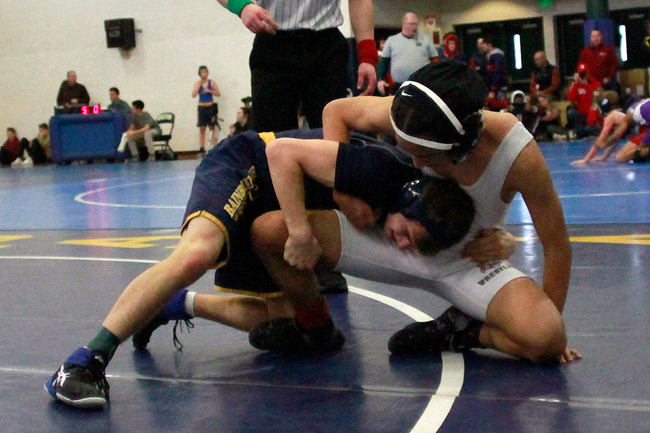 Spartan wrestlers manage four top finishes in annual Island Invitational