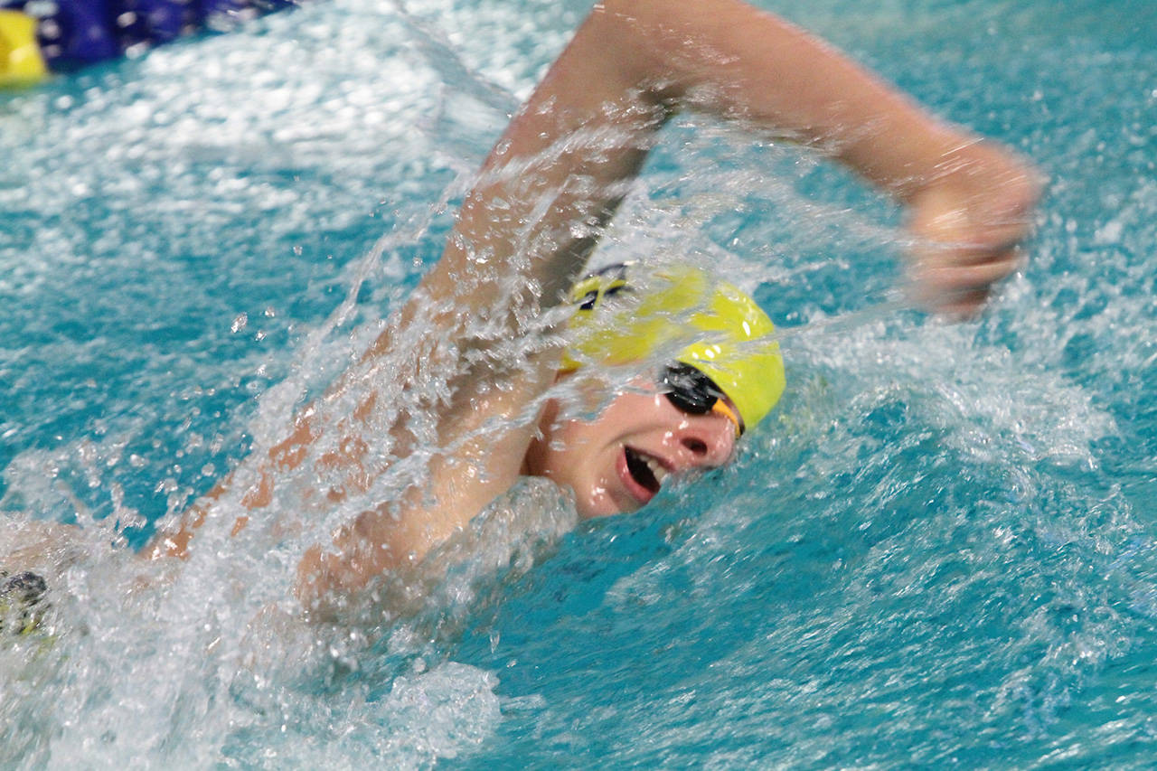 Jason Nordgren swims in the 200-yard freestyle for the Bainbridge Spartans in the team’s matchup against Newport.(Brian Kelly | Bainbridge Island Review)