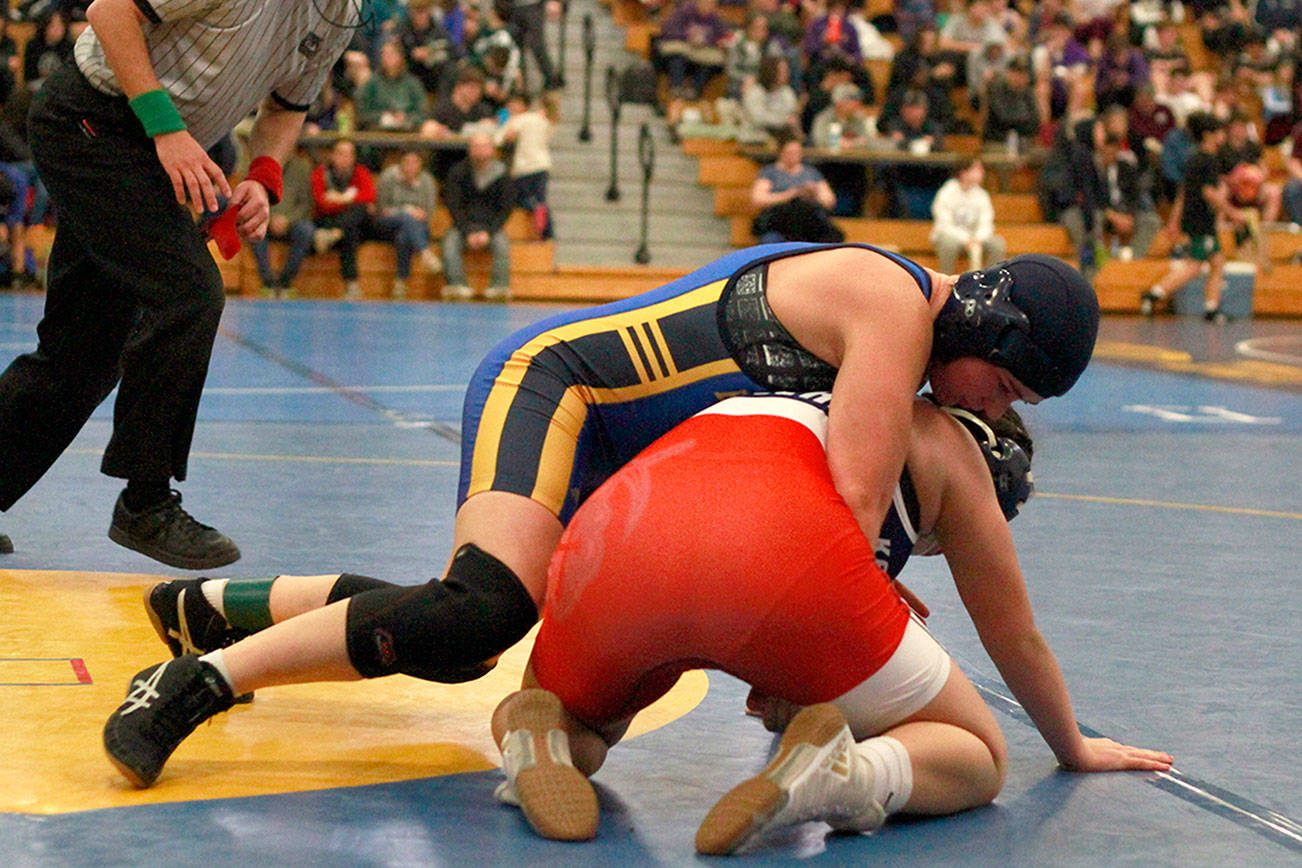 Island wrestlers stand tall at annual invitational | Photo gallery