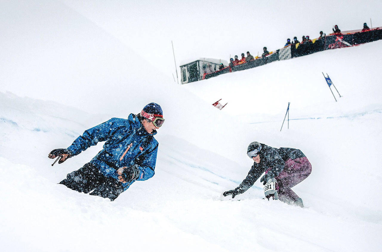 Kevin McHugh photo | Devon Raney following Tom Burt down the course at the 30th annual Mount Baker Legendary Banked Slalom in 2016. Raneys new memoir, Still Sideways, is available now in print and audiobook versions from Patagonia.