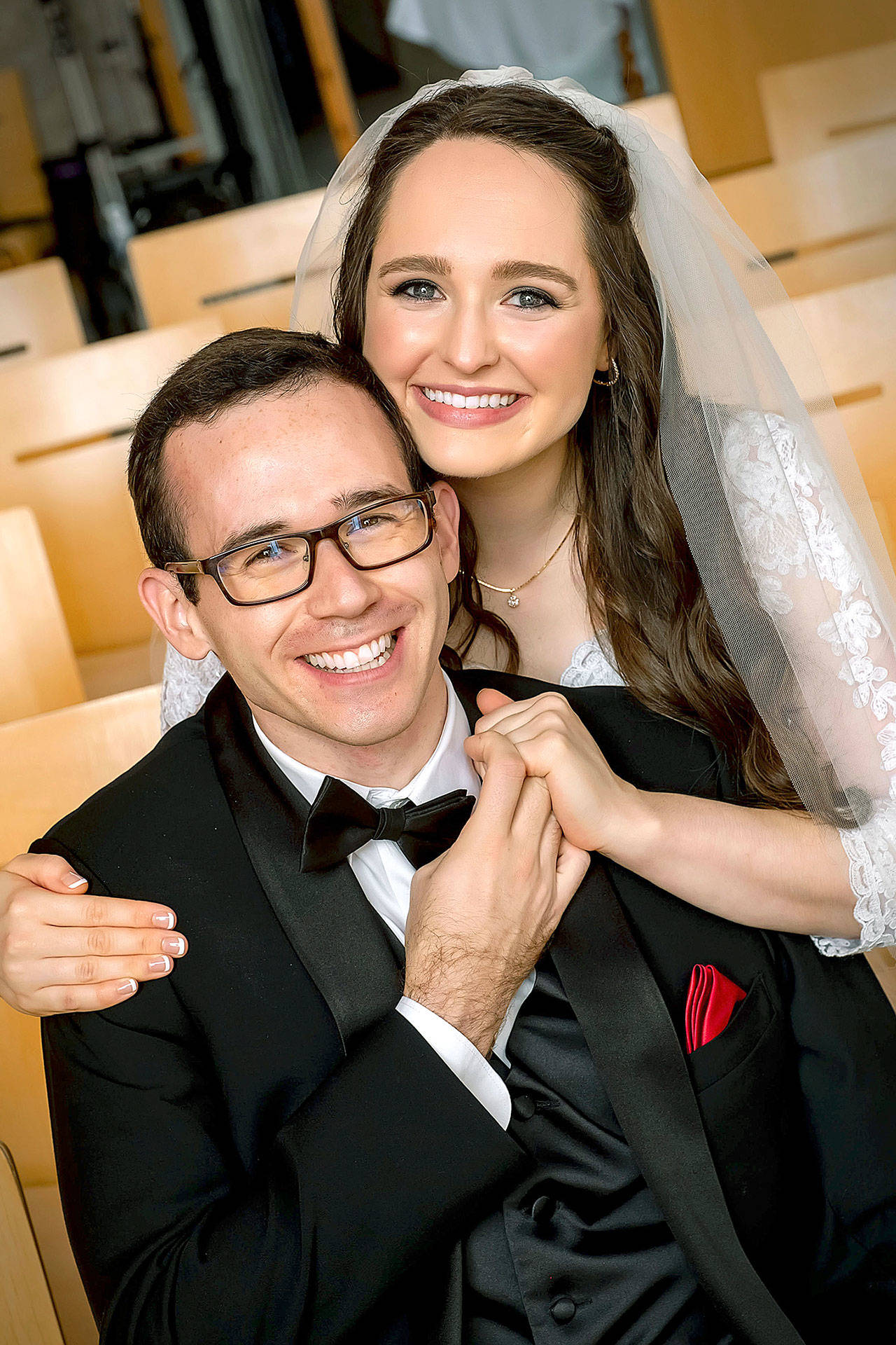 Carolyn M. Milander and Cody L. Hunter exchanged vows in a double-ring wedding ceremony at Grace Episcopal Church.