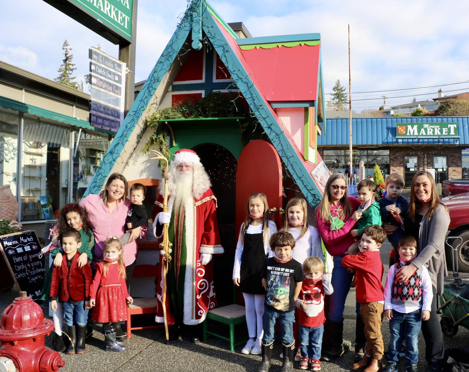 Children ranging in age from 2-10 years old spent the afternoon chatting with Santa at his Poulsbo Cottage. KPark/NKH.
