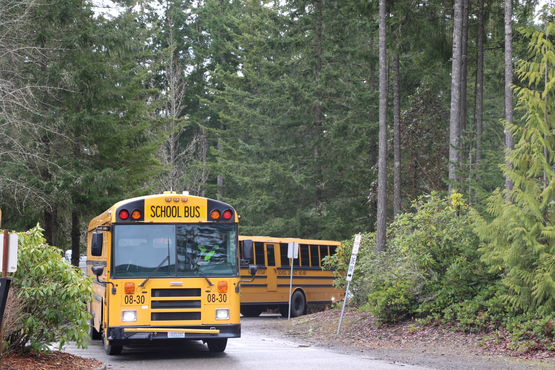 Buses arrive at Vinland Elementary to drop off kids for the afternoon session of hybrid learning. Ken Park/North Kitsap Herald photos