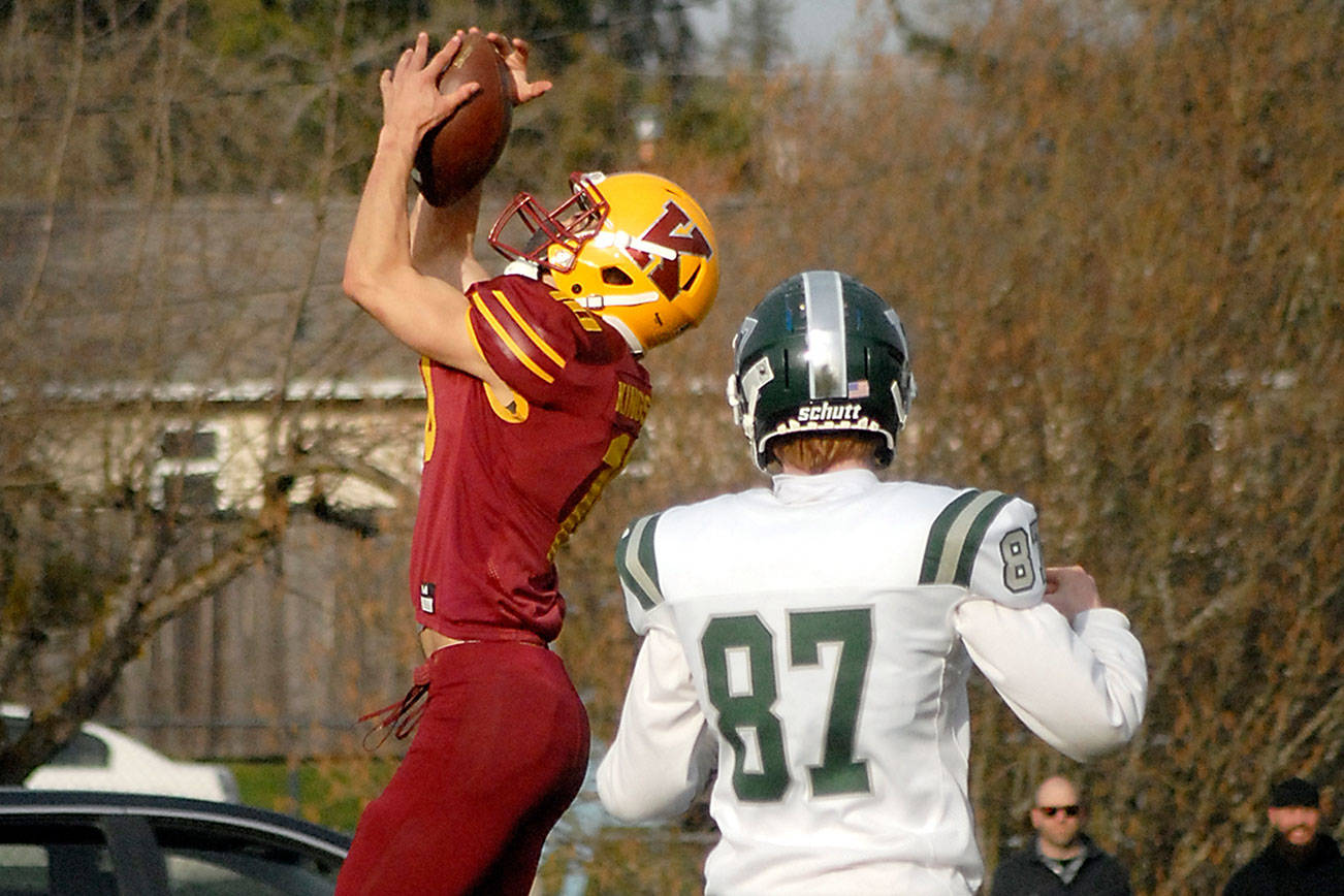 Keith Thorpe/Peninsula News Group
Kingston's Kyler Coe-yarr pulls down an interception from a pass intended for Port Angeles' Cyras Mills in the closing moments of the first half on Saturday in Port Angeles.