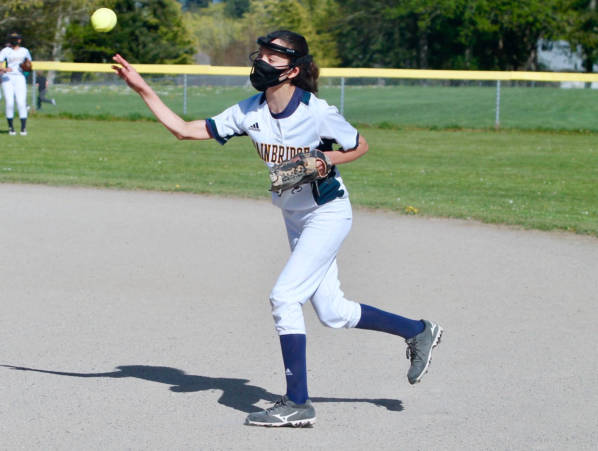 Kate Wikstrom makes the play on a ground ball at second base against Olympic. (Mark Krulish/Kitsap News Group)