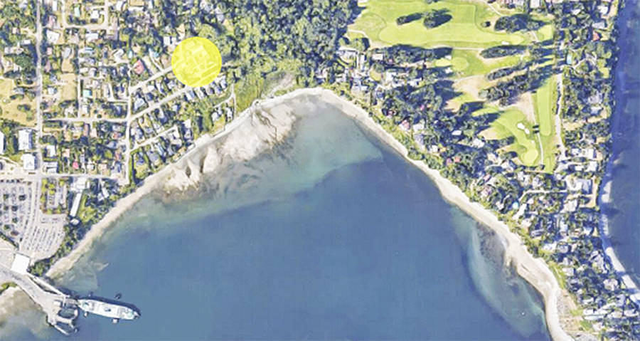 Aerial photo with big green dot at left showing location of wastewater treatment plant. Outfall goes to the Sound at right, rather than harbor below.
