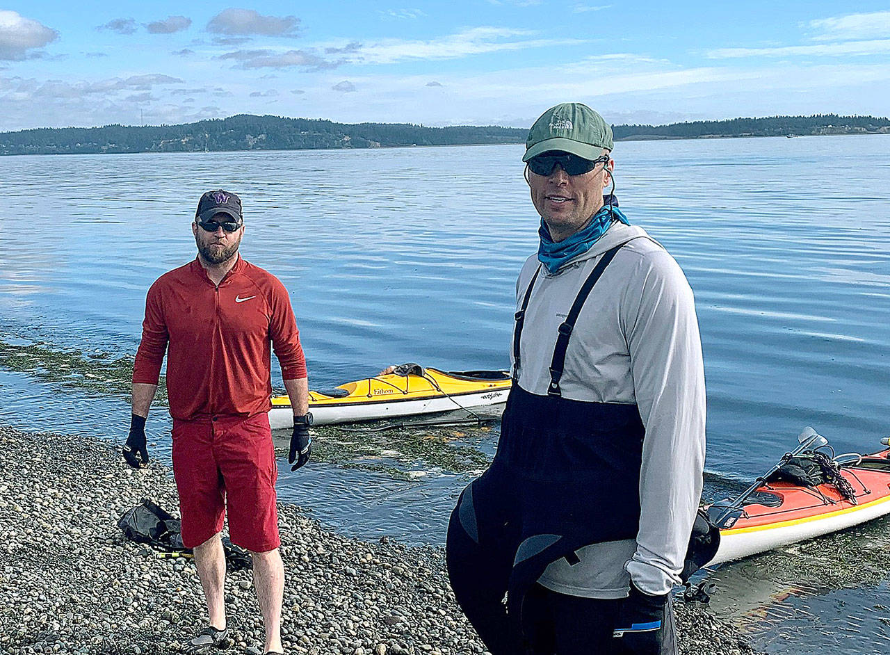 Dan Dinsmore and Matt Kress of Bainbridge at Fay Beach after completing the first leg (Kate Hough/Contributed photo)