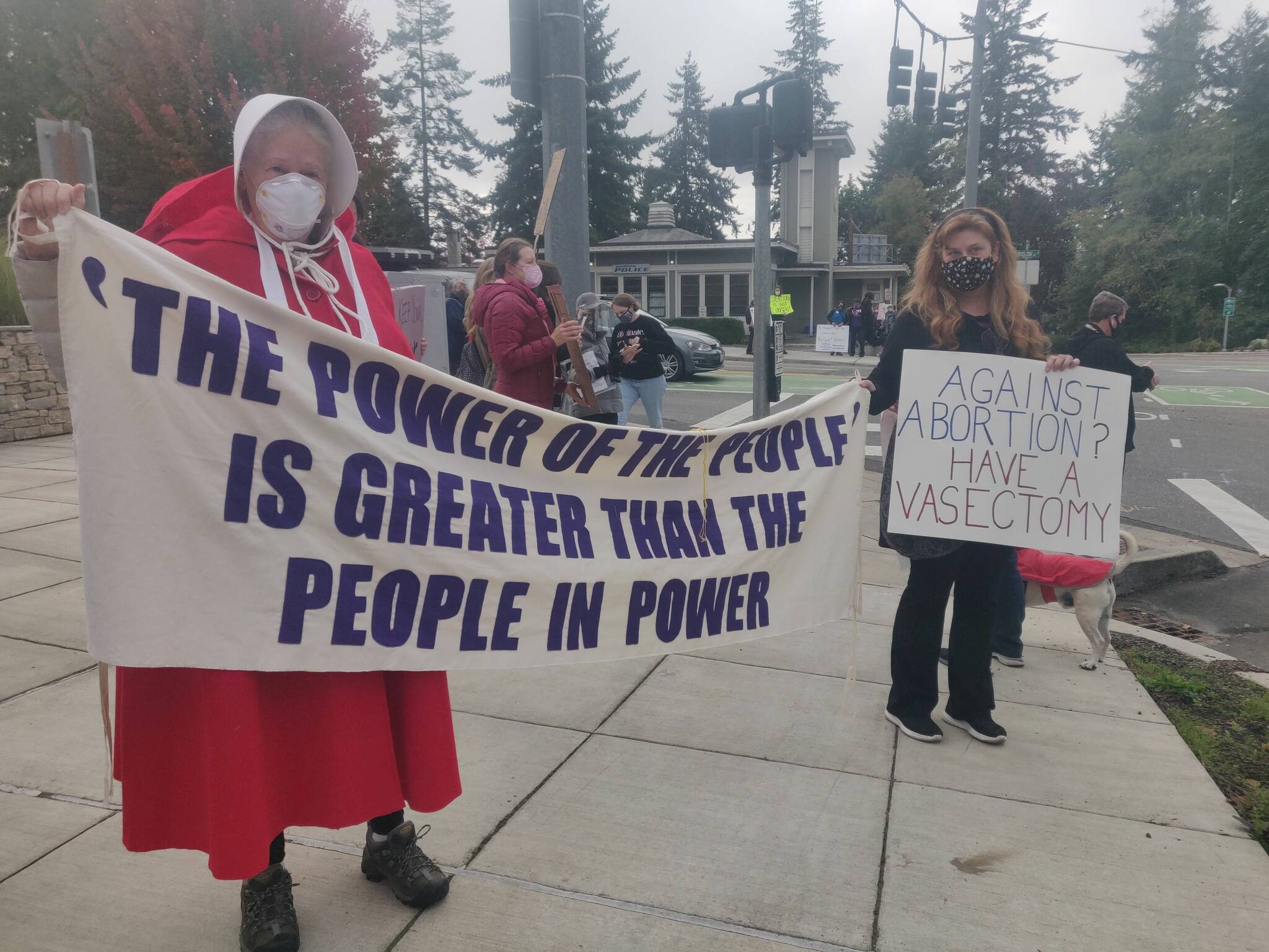 Protesters gather at the ferry terminal in Bainbridge Island. Photo courtesy of Holly Brewer