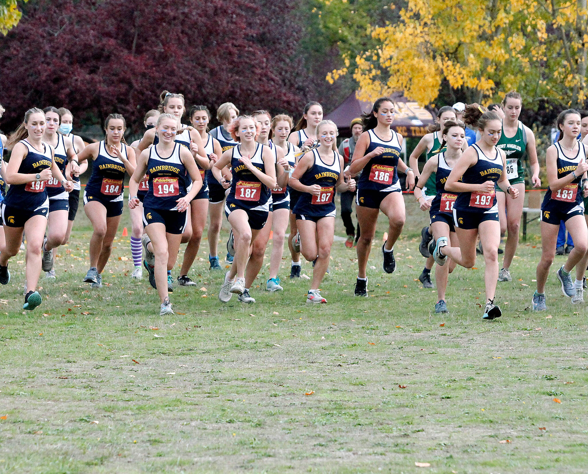 Review file photo 
The Bainbridge HS girls cross country team, shown here taking off during a league meet at Battle Point Park, took home the Olympic League championship last week.
