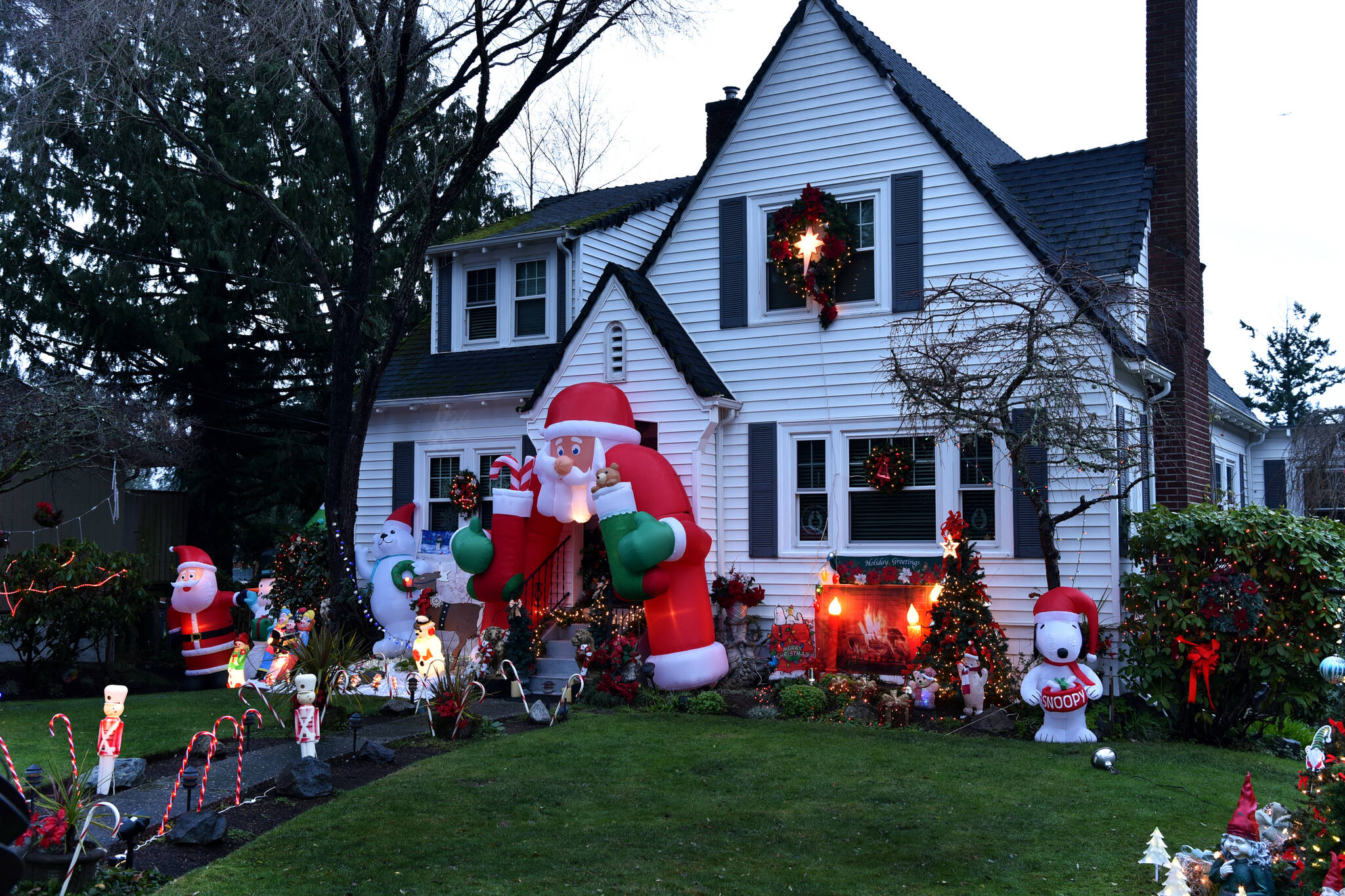 Santa greets visitors at the front door.